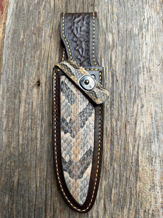 Randall Model 25-6 sheath with a Canebrake RattleSnake skin from Treeman Sheaths. Vibrant colors and along side Copperheads the hardest skin to source.