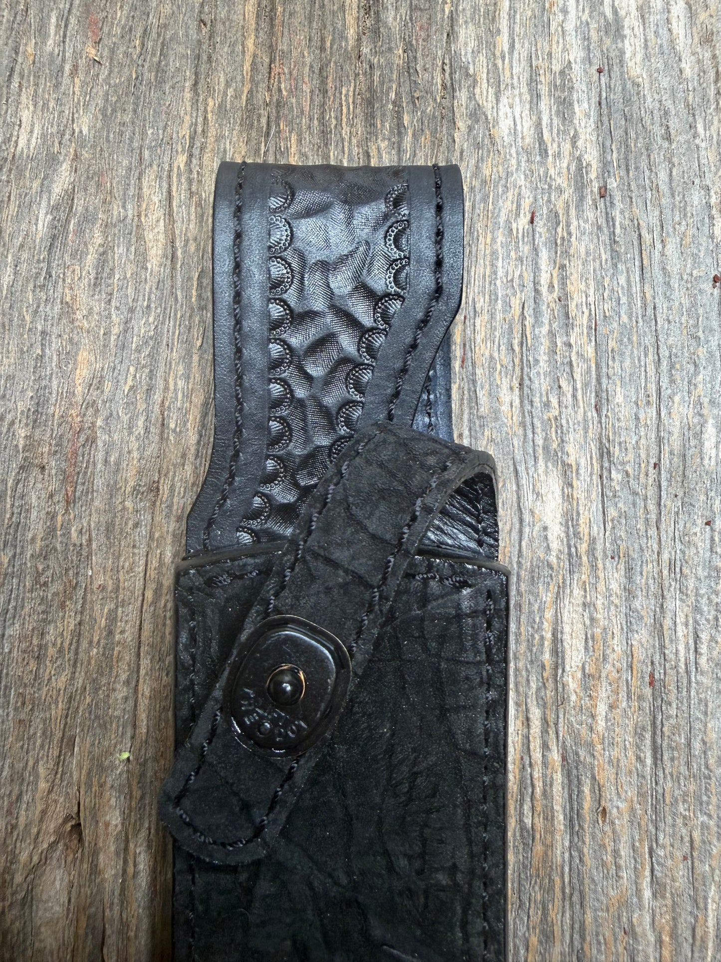 Randall Model Buxton Fighter in Black Hippo, forward curved hilt, black Canteen Snap, full brass stamping and stitching.