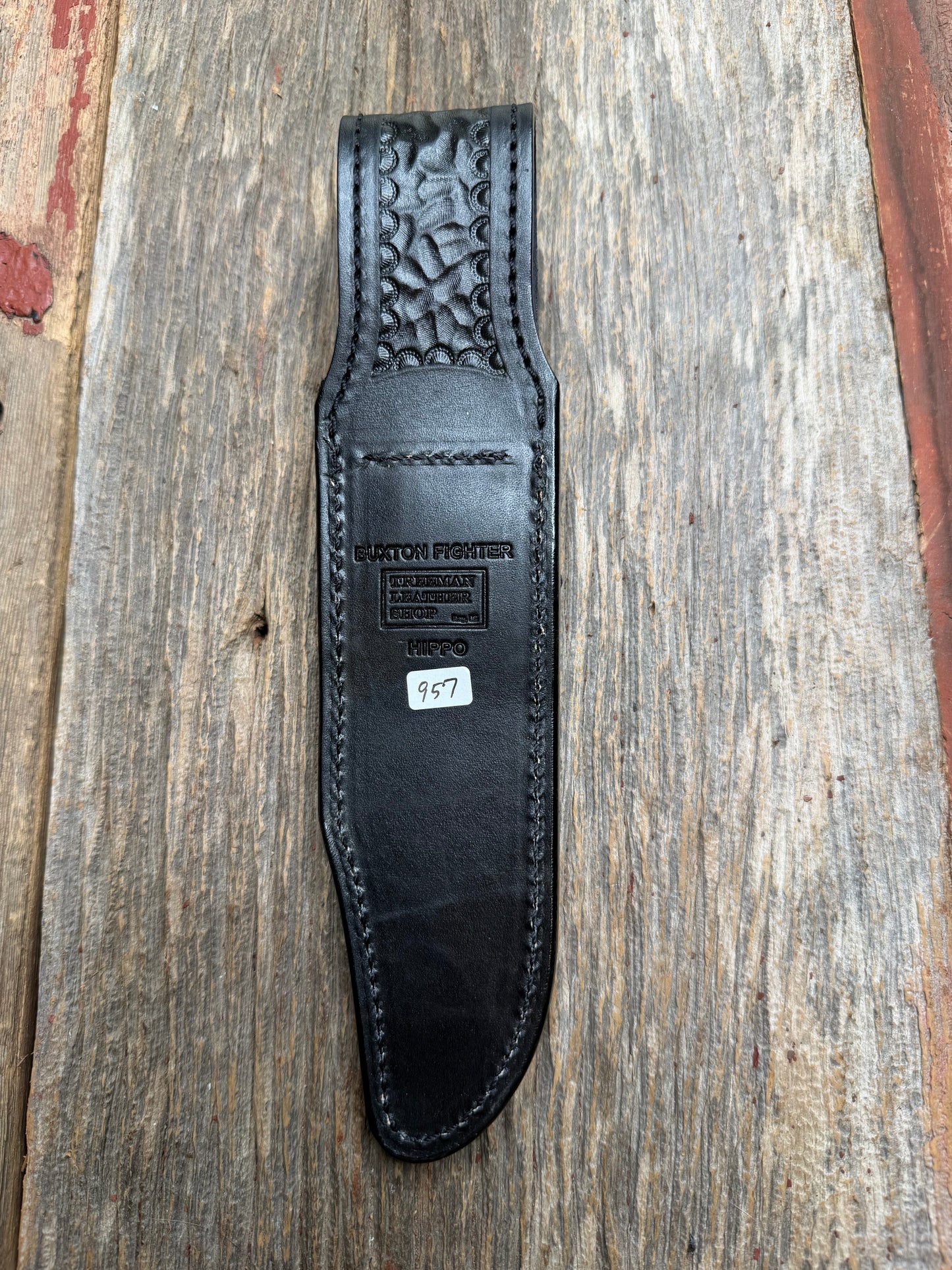 Randall Model Buxton Fighter in Black Hippo, forward curved hilt, black Canteen Snap, full brass stamping and stitching.