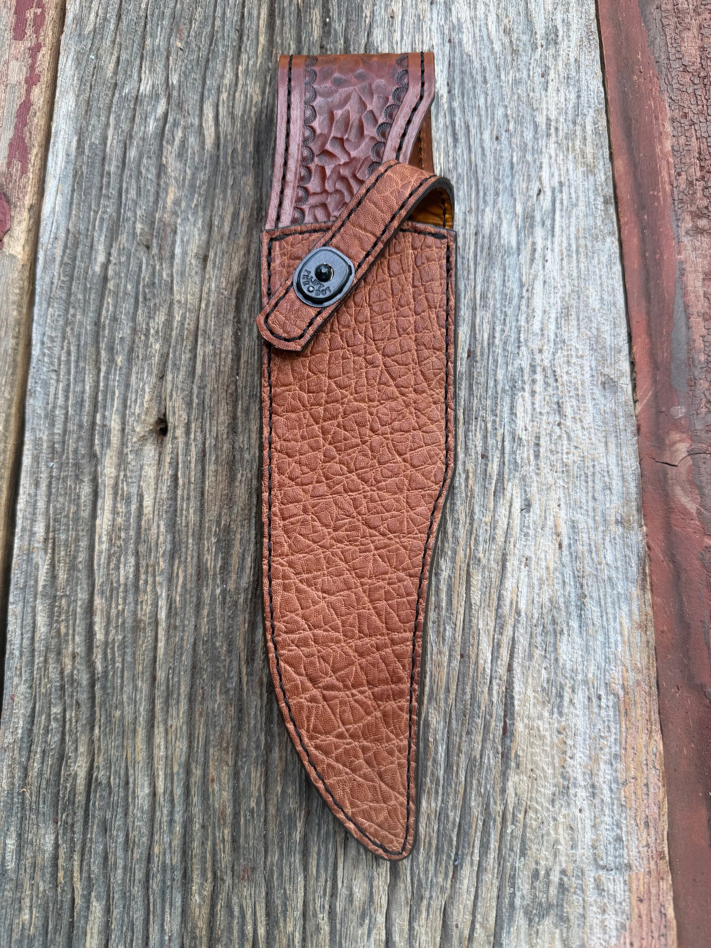 New Randall Model 12-8 Big Bear Sheath in Exotic thick and textured Rust colored Elephant hide on brown leather from Treeman with a black Canteen snap. Hand tooled belt loop. Killer sheath.