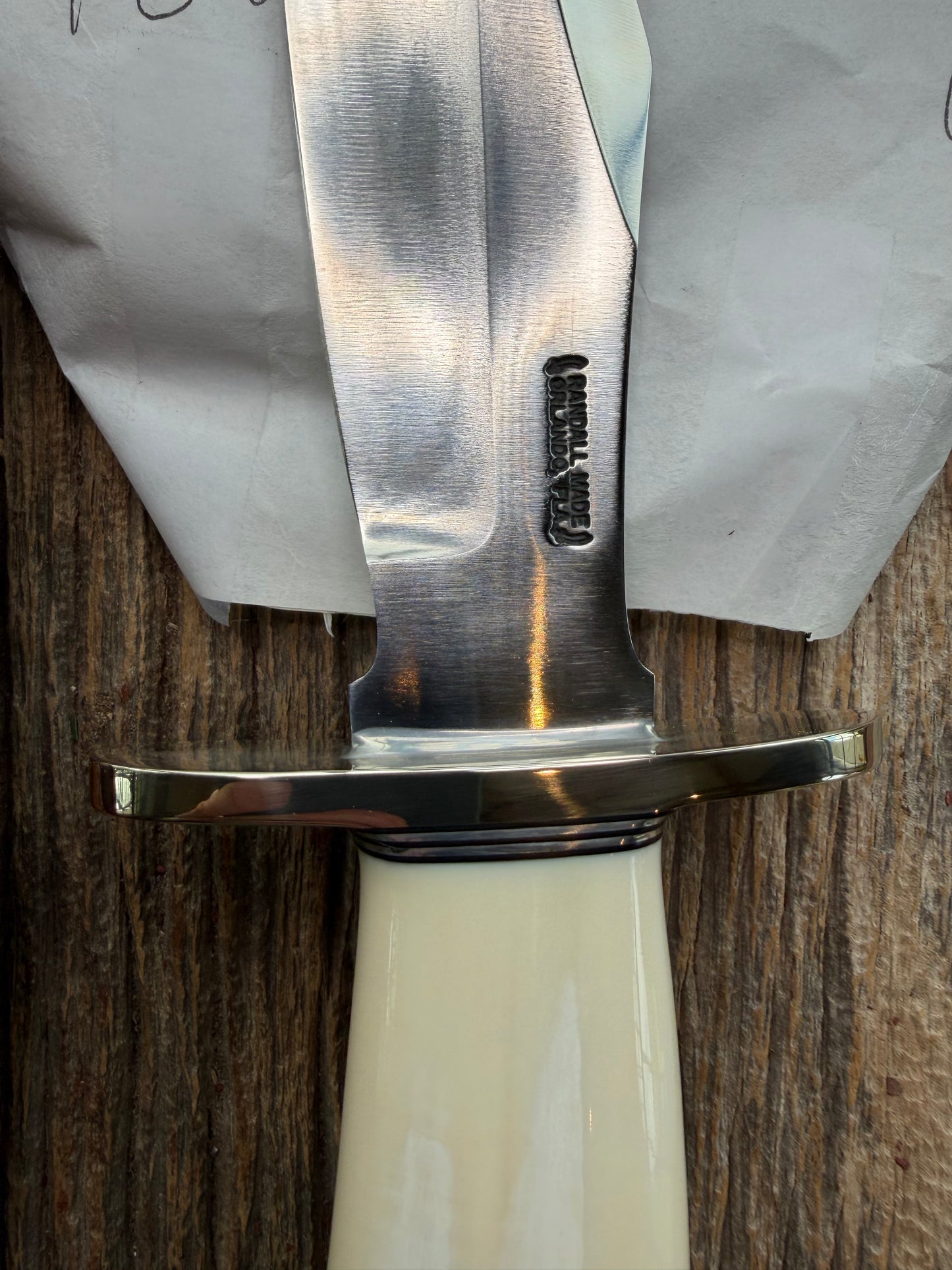 New in paper fresh from the Shop. Randall Knife Model 12-8 Big Bear. Gorgeous piece of creamy Fossil Walrus Ivory. Nickel silver hilt and plate end, Carbon  steel.
