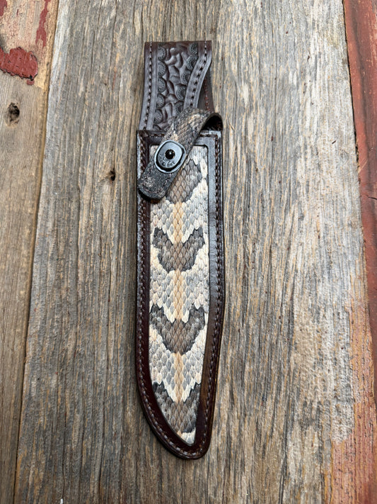 Randall Model 1-8 sheath with a Canebrake RattleSnake skin from Treeman Sheaths. Vibrant colors and along side Copperheads the hardest skin to source.