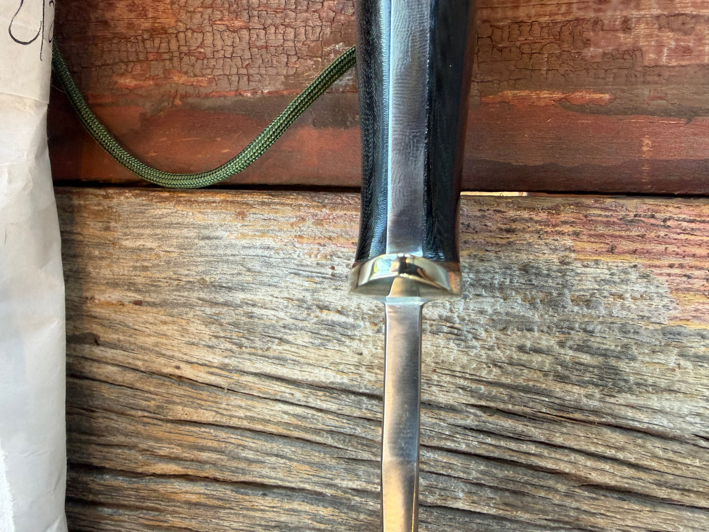 New in Paper Randall Model 16 SP#1 Special fighter with a Black Micarta handle. SS blade, Nickel silver Straight hilt. Lanyard. Brown leather sheath.