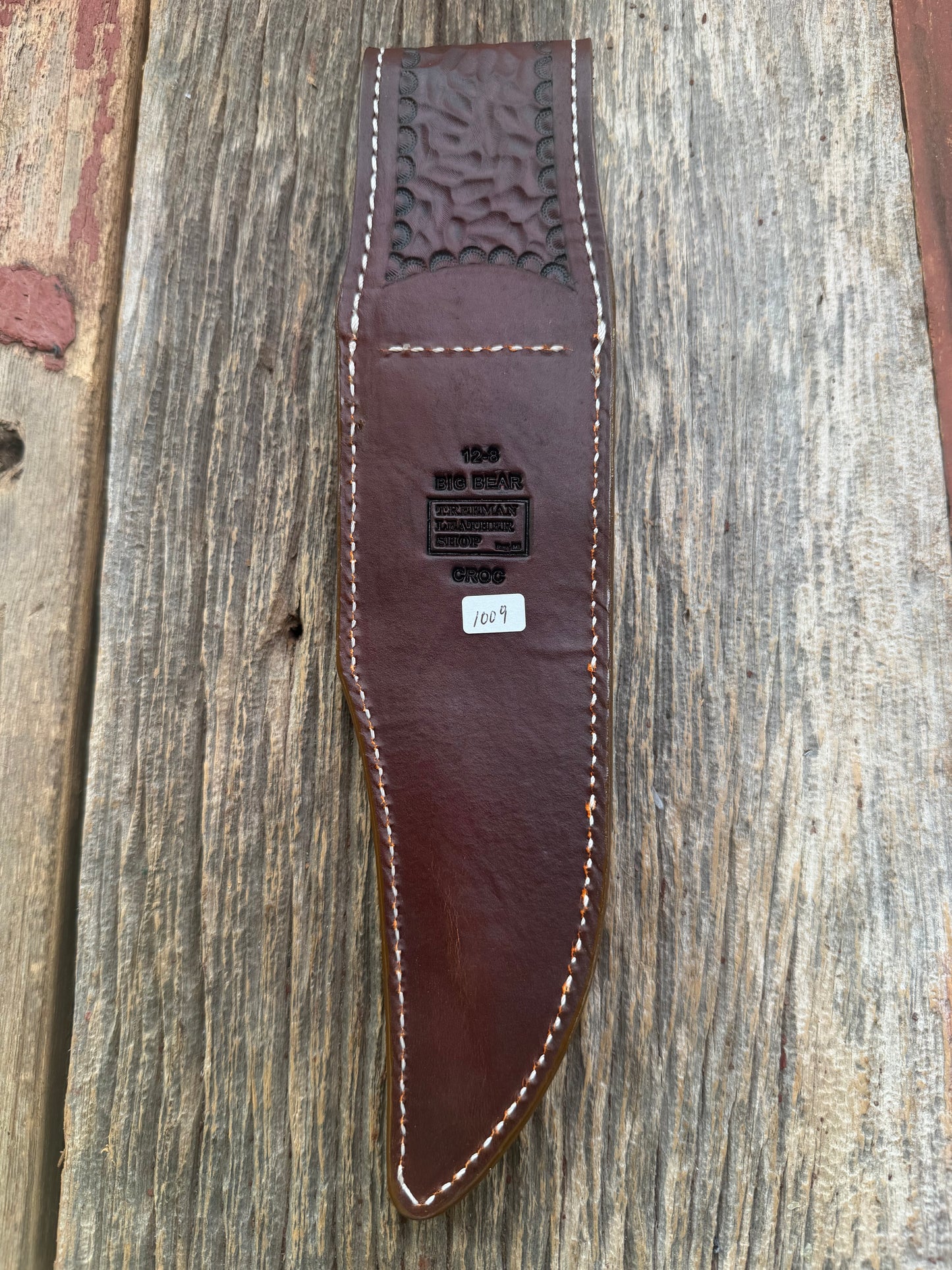 New Randall Model 12-8 Big Bear Sheath in Exotic thick and textured Honey Crocodile skin on brown leather from Treeman with a silver Canteen snap. Hand tooled belt loop. Killer sheath.