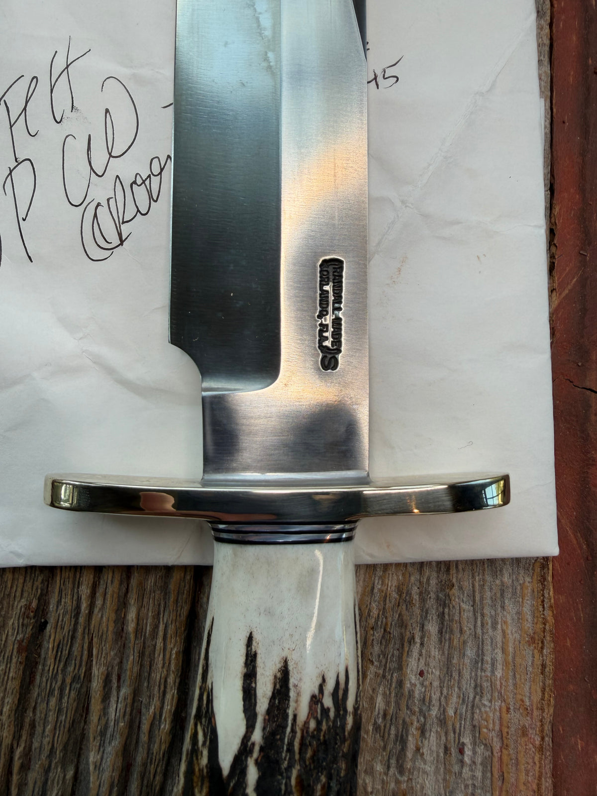 New in Paper Randall Model 12-9/14 Grind with a really nice piece of Crown stag. SS, Nickel Silver Hilt black and Aluminum  spacers.
