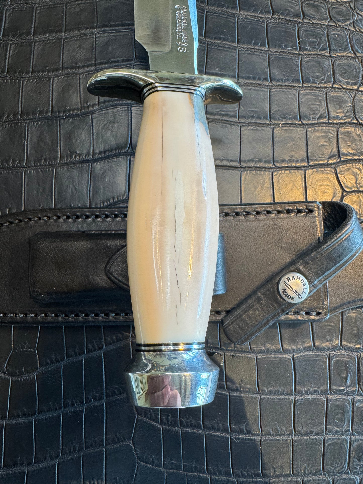 Randall Model 1-7 in Creamy Fossil Walrus Ivory. Nickel Silver Hilt and Aluminum Flanged Butt cap. ( slight crack)