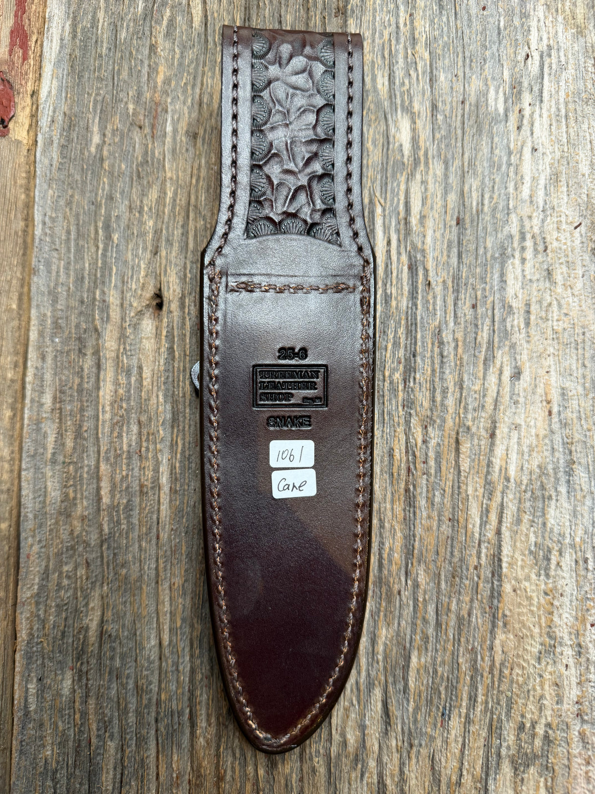 Randall Model 25-6 sheath with a Canebrake RattleSnake skin from Treeman Sheaths. Vibrant colors and along side Copperheads the hardest skin to source.