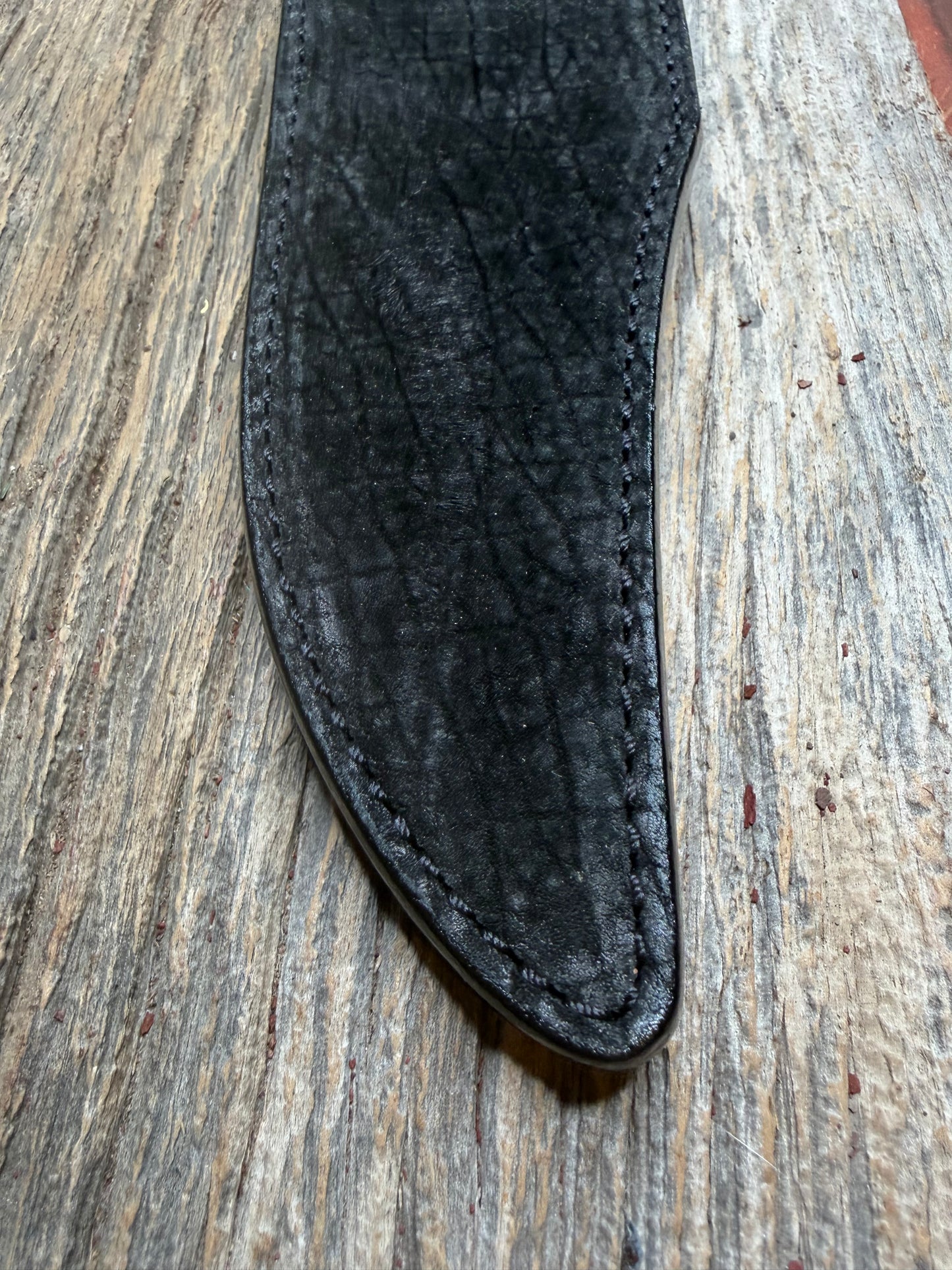 Randall Model 12-8 “Big Bear” in Black Hippo, forward curved hilt, black Canteen Snap, full brass stamping and stitching.