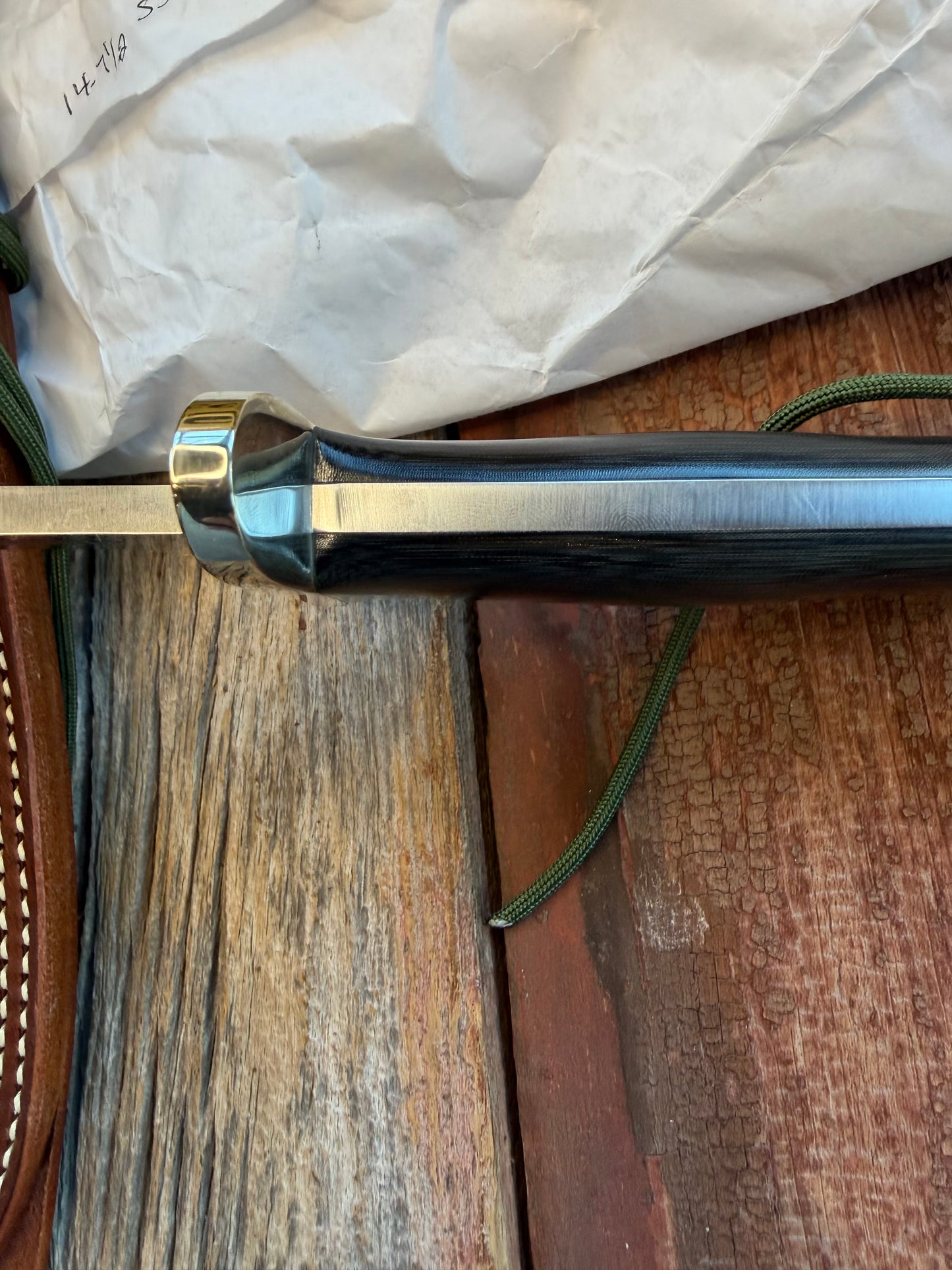 New in Paper Randall Model 14-7.5 in Black Micarta handle, Nickel Silver Hilt, Stainless steel, Sawteeth and Lanyard.