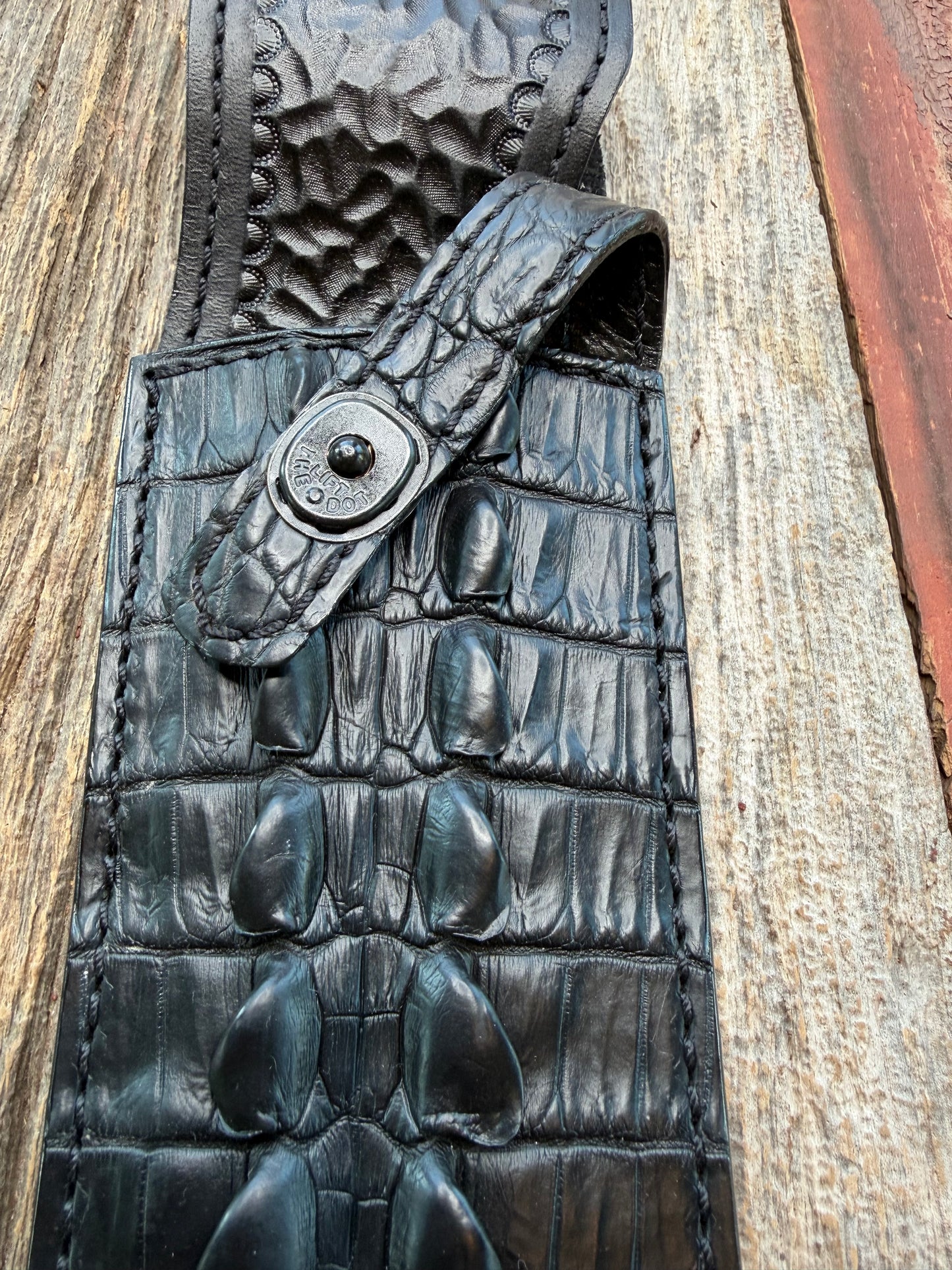 New Randall Model 12-11 Smitty Sheath in Exotic Black Matte Crocodile Tail from Treeman with the newest Black Canteen snap. Killer sheath.