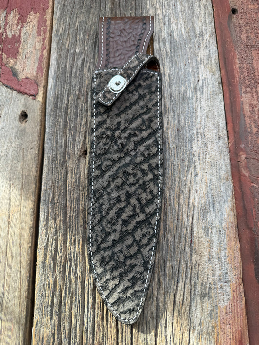 New Randall Model 12-11 Large Sasquatch Sheath in Exotic thick and textured Black and Grey Elephant Ear  on brown leather from Treeman with a silver Canteen snap. Hand tooled belt loop. Killer sheath.