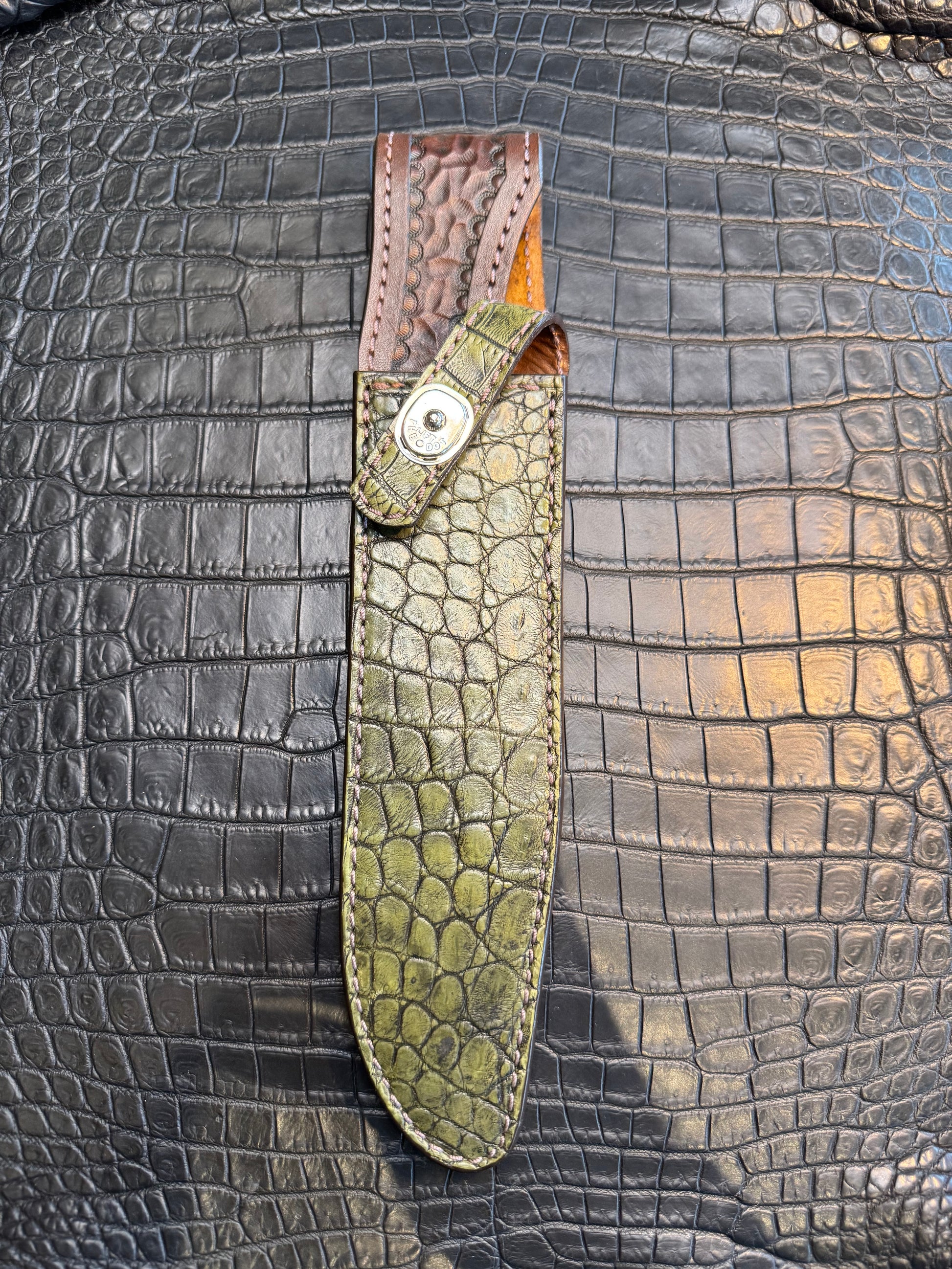 Randall Model 1-8 in Army Green Crocodile. Straight hilt, Canteen Snap, full brass stamping and stitching.