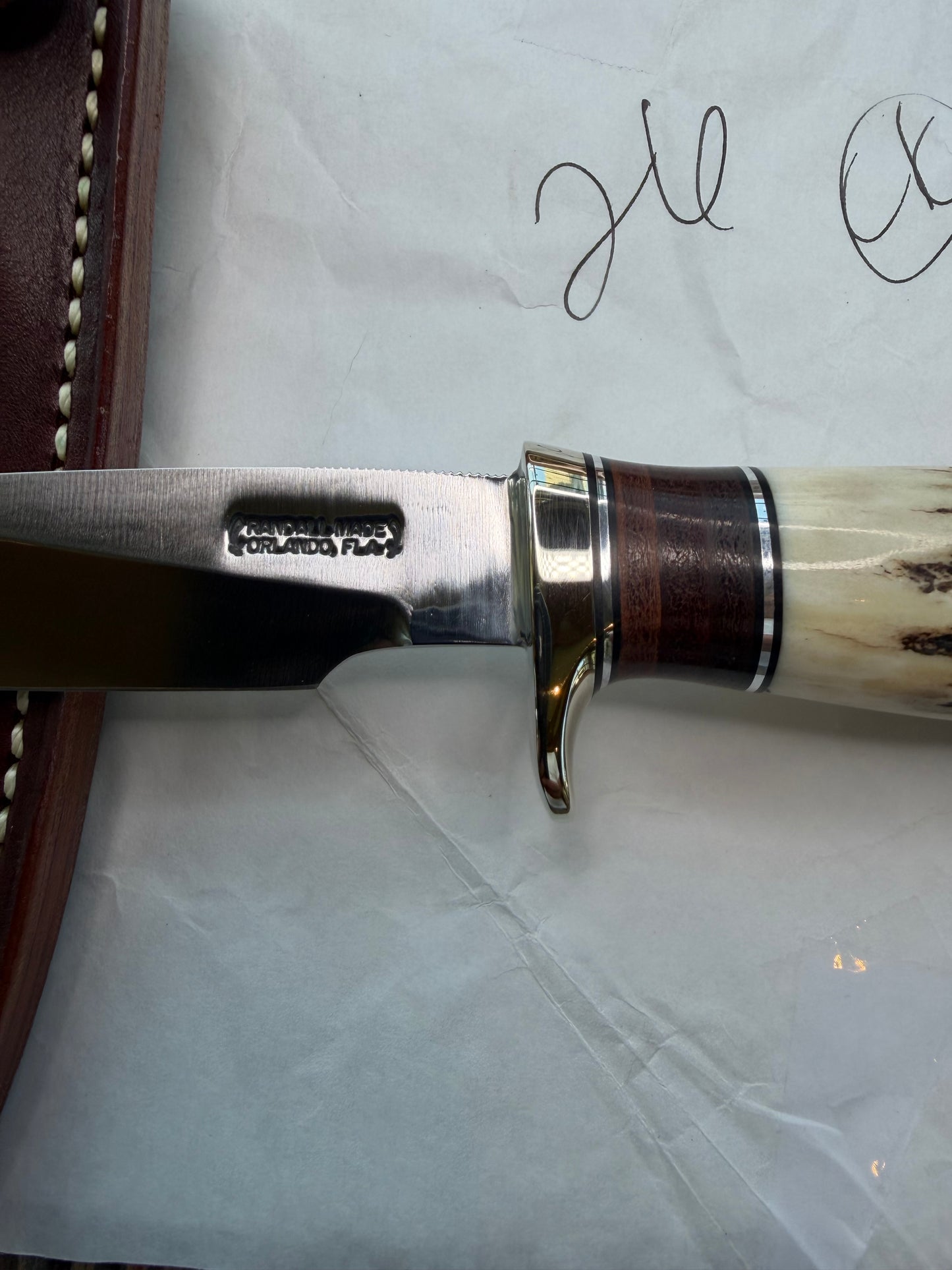 New in paper Randall Knife Model 26 Pathfinder. Stag, Black and Aluminum and leather spacers, Lanyard, NSH and buttcap.