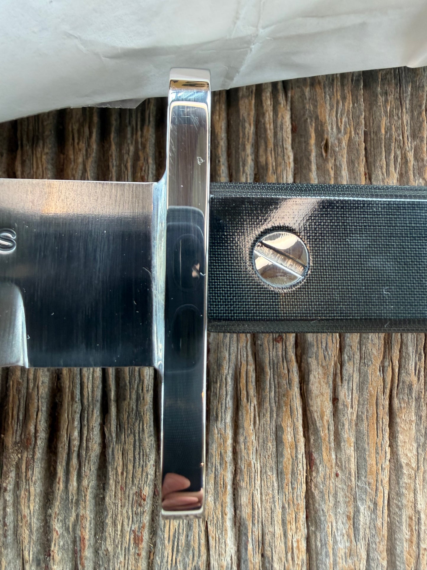 New in Paper Randall Model 17-5.5 Astro knife is a custom, handmade combat knife with a 5.5" stainless steel clip point blade and a brown leather sheath. Full tang design, black handle.