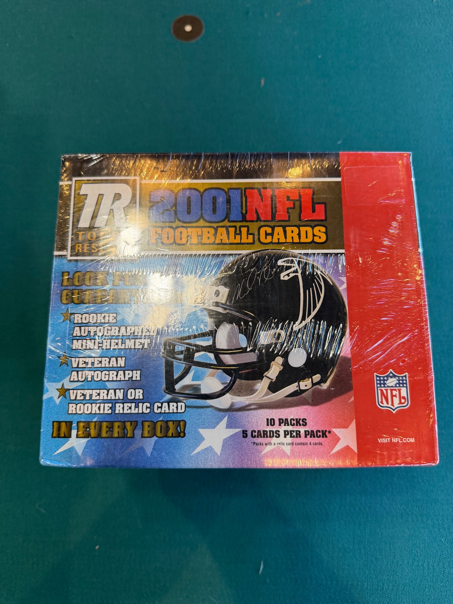 2001 Topps Reserve Football Hobby Unopened Box Drew Brees Rookie Year 10 packs per box, 5 Cards per pack and an autographed Mini Helmet. Rare Box still sealed from 35 years ago.