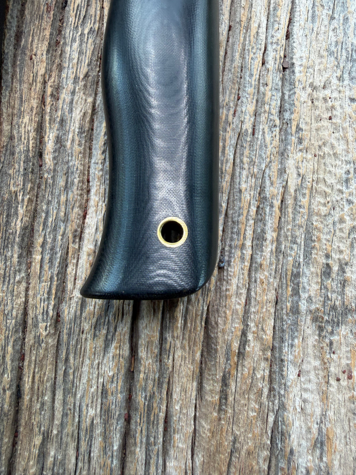 Nice Randall Model 28 Woodsman in Black Micarta. SS blade, brass single hilt. Lanyard hole. Black leather sheath.