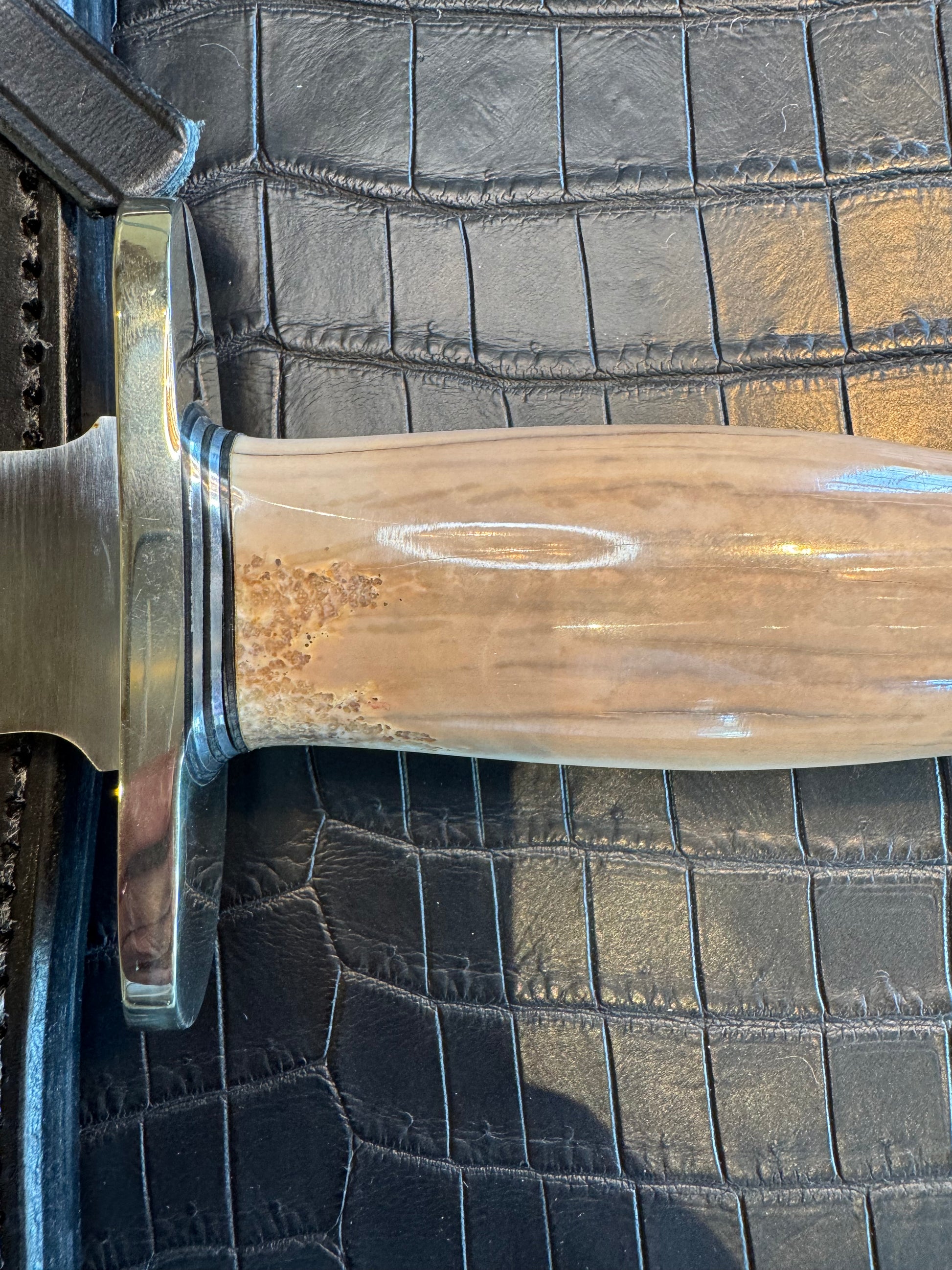 Randall Model 12-8 Big Bear in a gorgeous piece of Creamy Fossil Walrus Ivory. Nickel Silver Hilt and a natural exposed end.