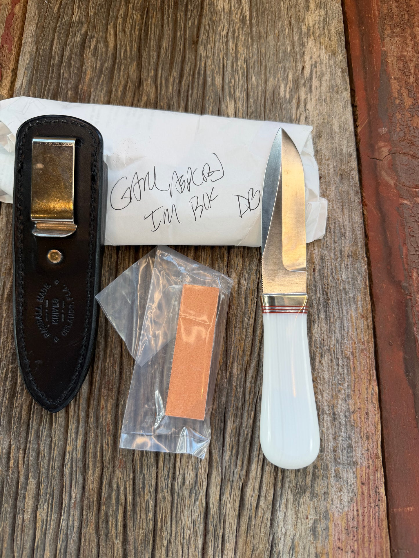 New in Paper Randall Model “Gambler” 4 Inch in Ivorite Nickel hilt, Stainless, red and Aluminum spacers.