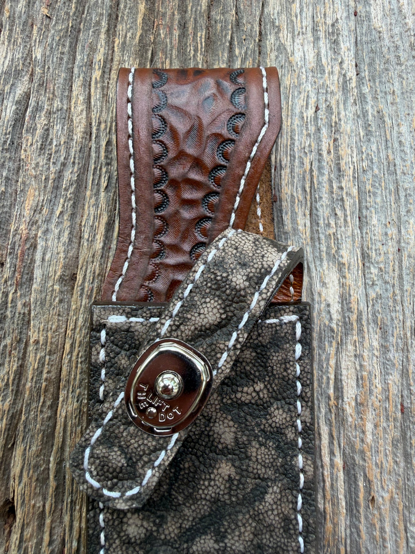 New Randall Model 1-7 Sheath in Exotic thick and textured Black and Grey Elephant Ear  on brown leather from Treeman with a silver Canteen snap. Hand tooled belt loop. Killer sheath.
