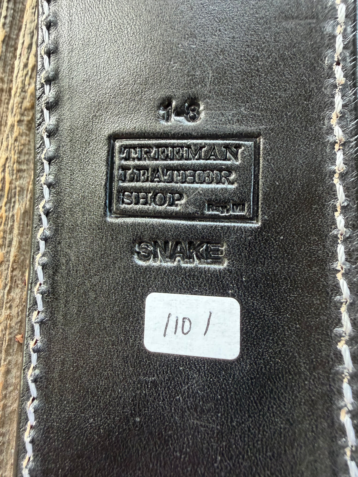 Randall Model 1-8 sheath with inlayed Western Diamondback RattleSnake skin from Treeman Sheaths. Brown leather, white deviated stitching and black canteen snaps.