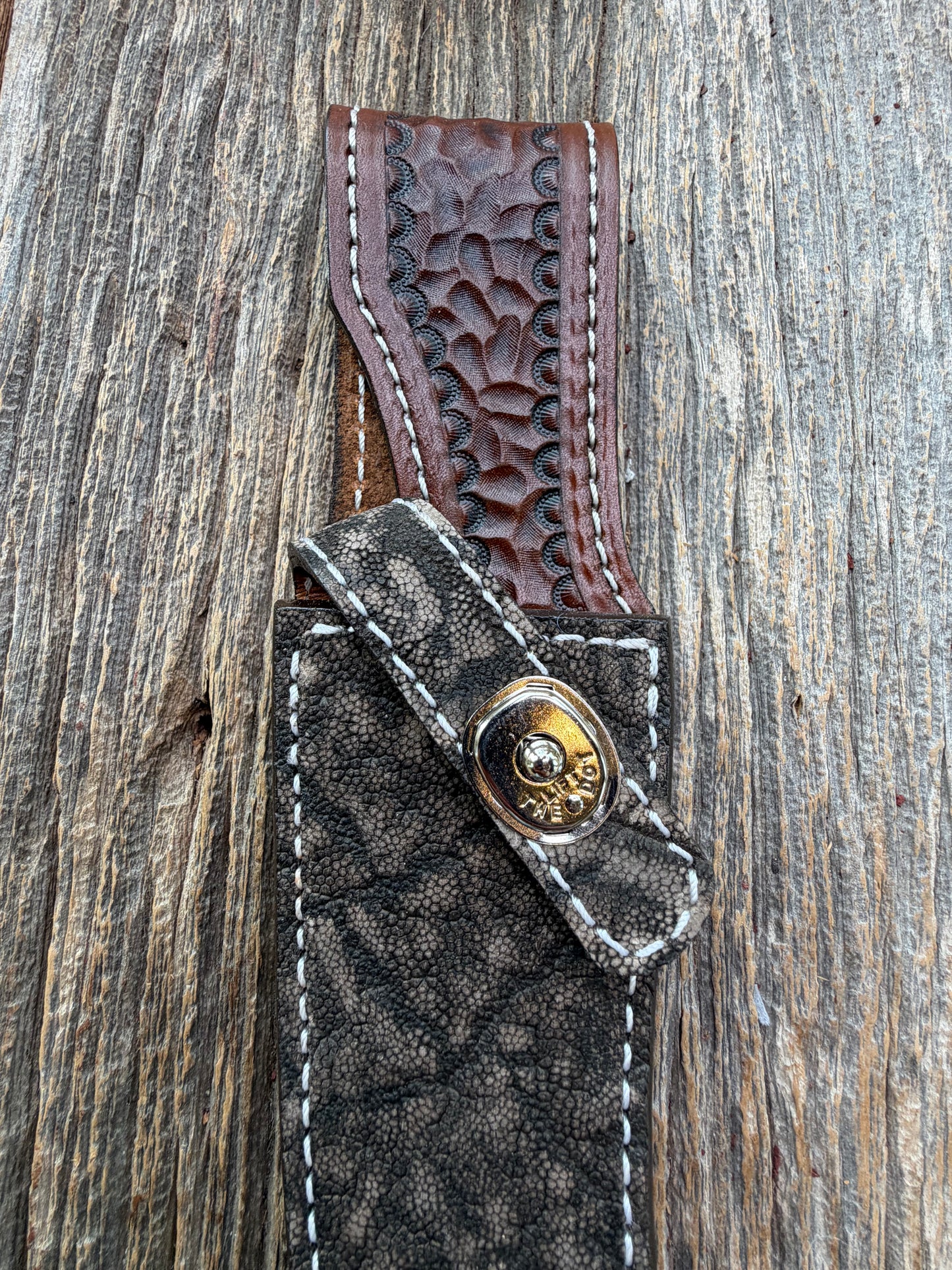 New Randall Model 27 Sheath in Exotic thick and textured Black and Grey Elephant Ear  on brown leather from Treeman with a silver Canteen snap. Hand tooled belt loop. Killer sheath.