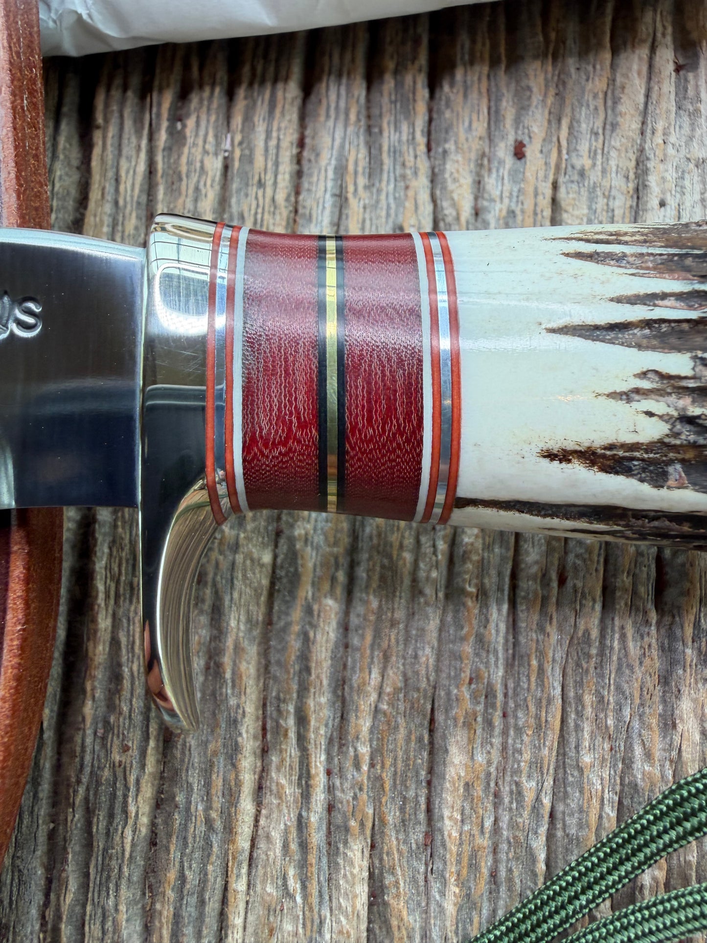 New in Paper Randall Made Knife Model 27-5 with a Stag handle, Stainless, Nickel silver single Hilt, red and aluminum spacers, loaded!!