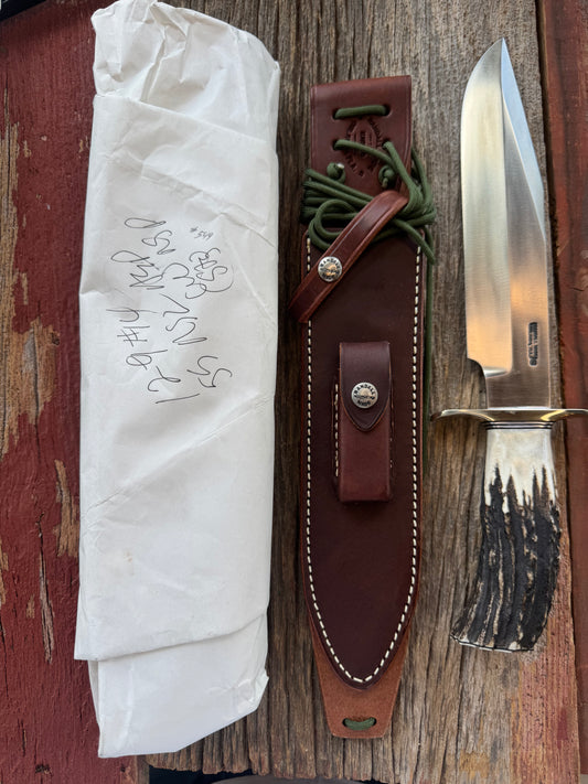 New in paper Randall Model 12-9/14 Grind Bowie with a Huge piece of Popcorn Stag. Nickel silver Hilt and Butt plate.