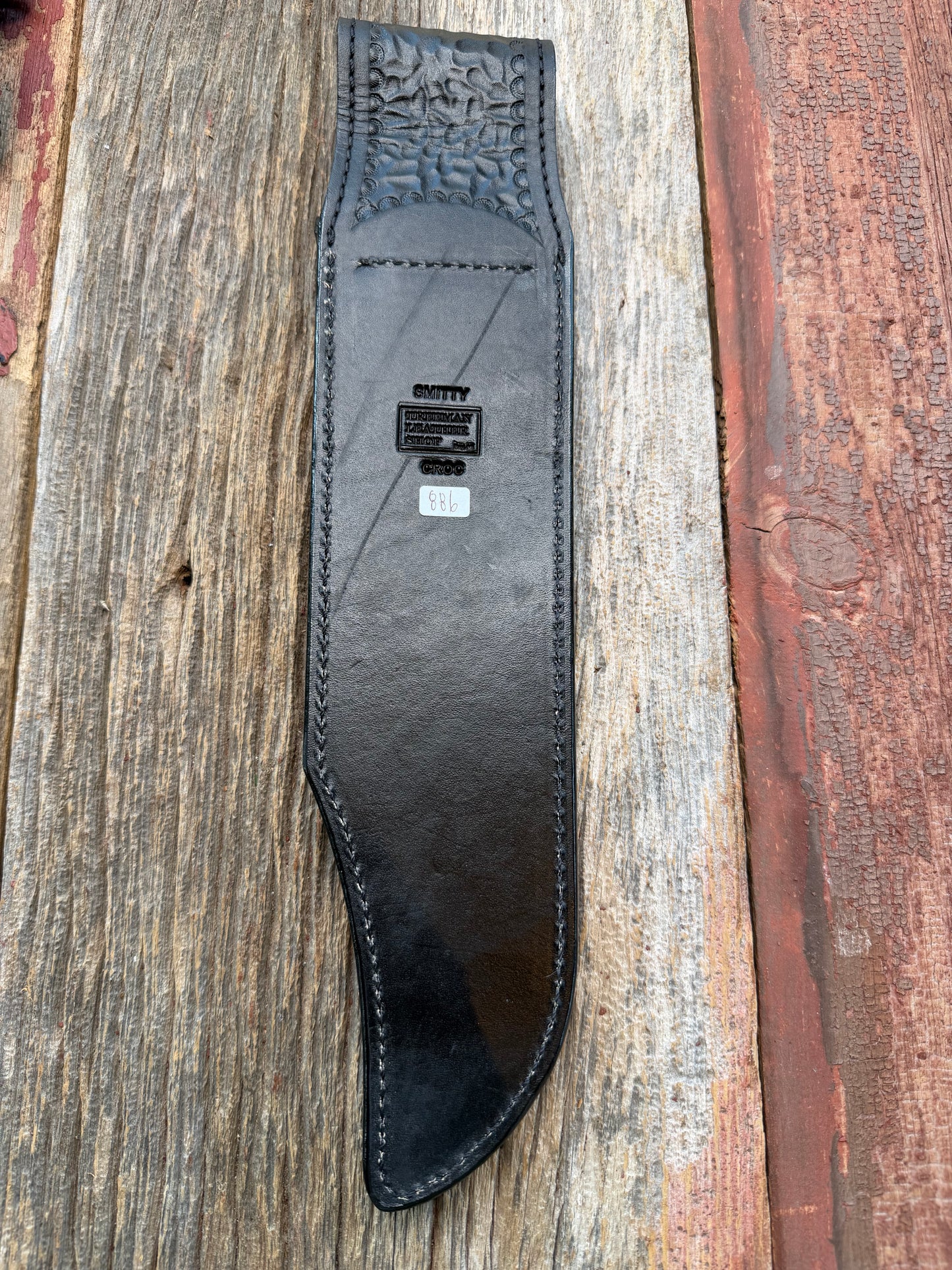 New Randall Model 12-11 Smitty Sheath in Exotic Black Matte Crocodile Tail from Treeman with the newest Black Canteen snap. Killer sheath.