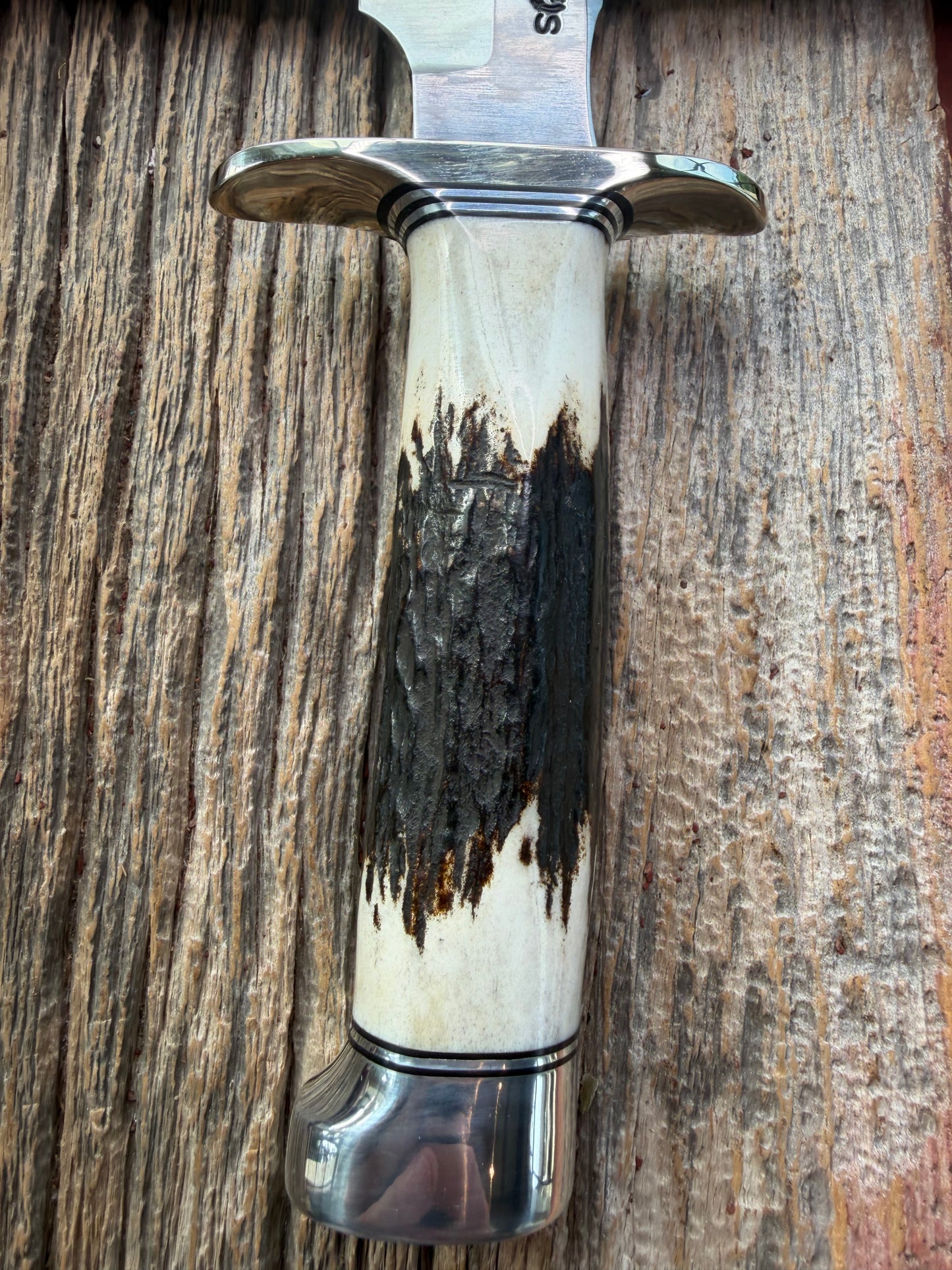 New in Paper Randall Made Knife Model 1-7 Stag , Stainless, Black and Aluminum spacers, Nickel Silver Hilt, Aluminum crows beak butt cap.