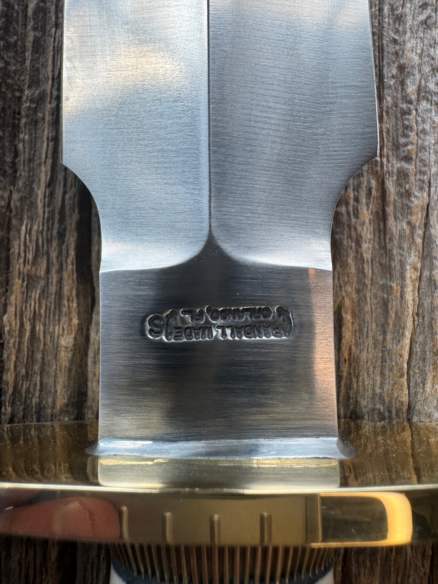 New in paper Randall Clinton Special with a nice piece of customer supplied Warthers Resin with a Stainless Steel blade, lugged Brass Hilt, brass scalloped butt cap and collar.