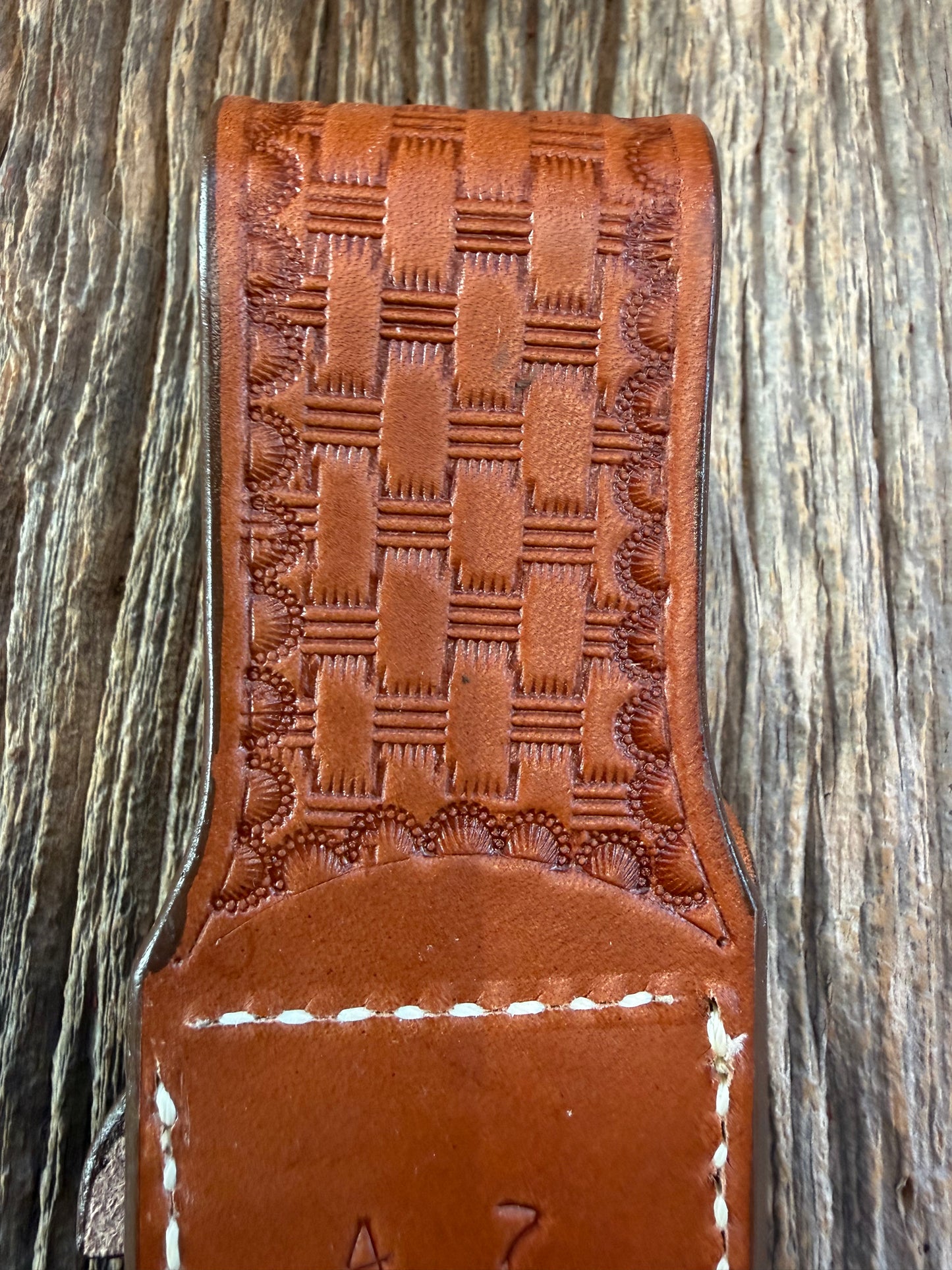 New Randall Model 4-7 Sheath in Exotic Brown Cape Buffalo with full leather hand tooled belt loop. Randall snap and stamp on the back. Custom Made at Sullivan’s by Gutcher