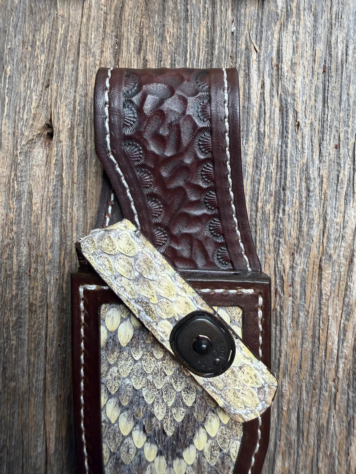 Randall Model 19-5 sheath with an Eastern Diamondback RattleSnake skin from Treeman Sheaths. Hand tooled belt loop, canteen snap. One the hardest skins to source.
