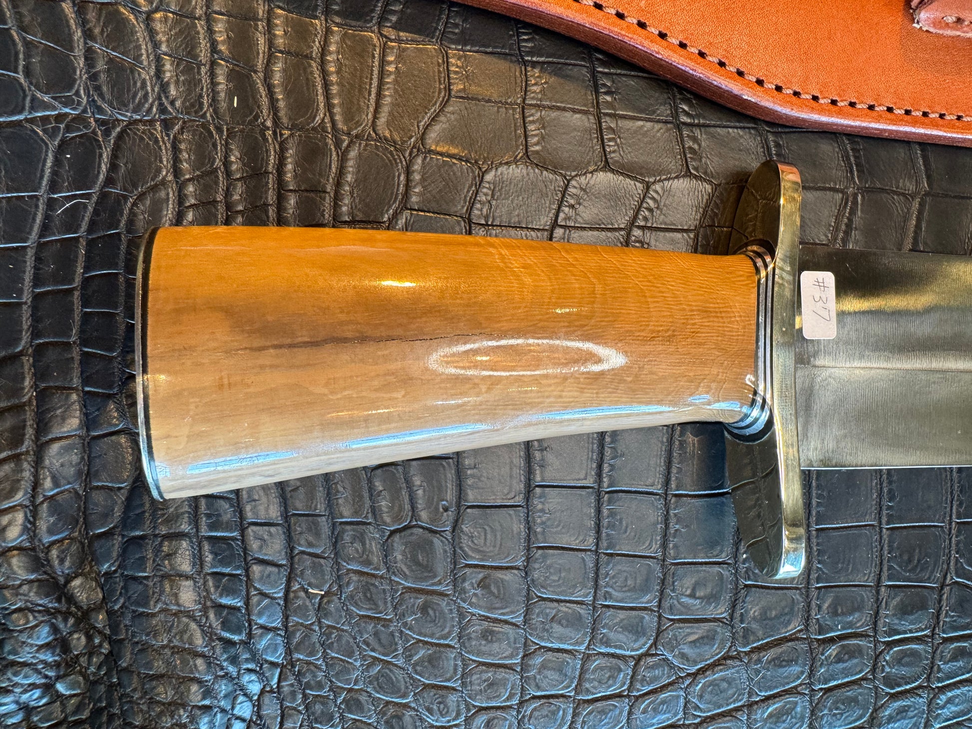 Randall Model 12-11 Smithsonian “Smitty” in a Huge piece of Green and Tan Fossil Walrus Ivory. Nickel Silver Hilt and Butt plate.