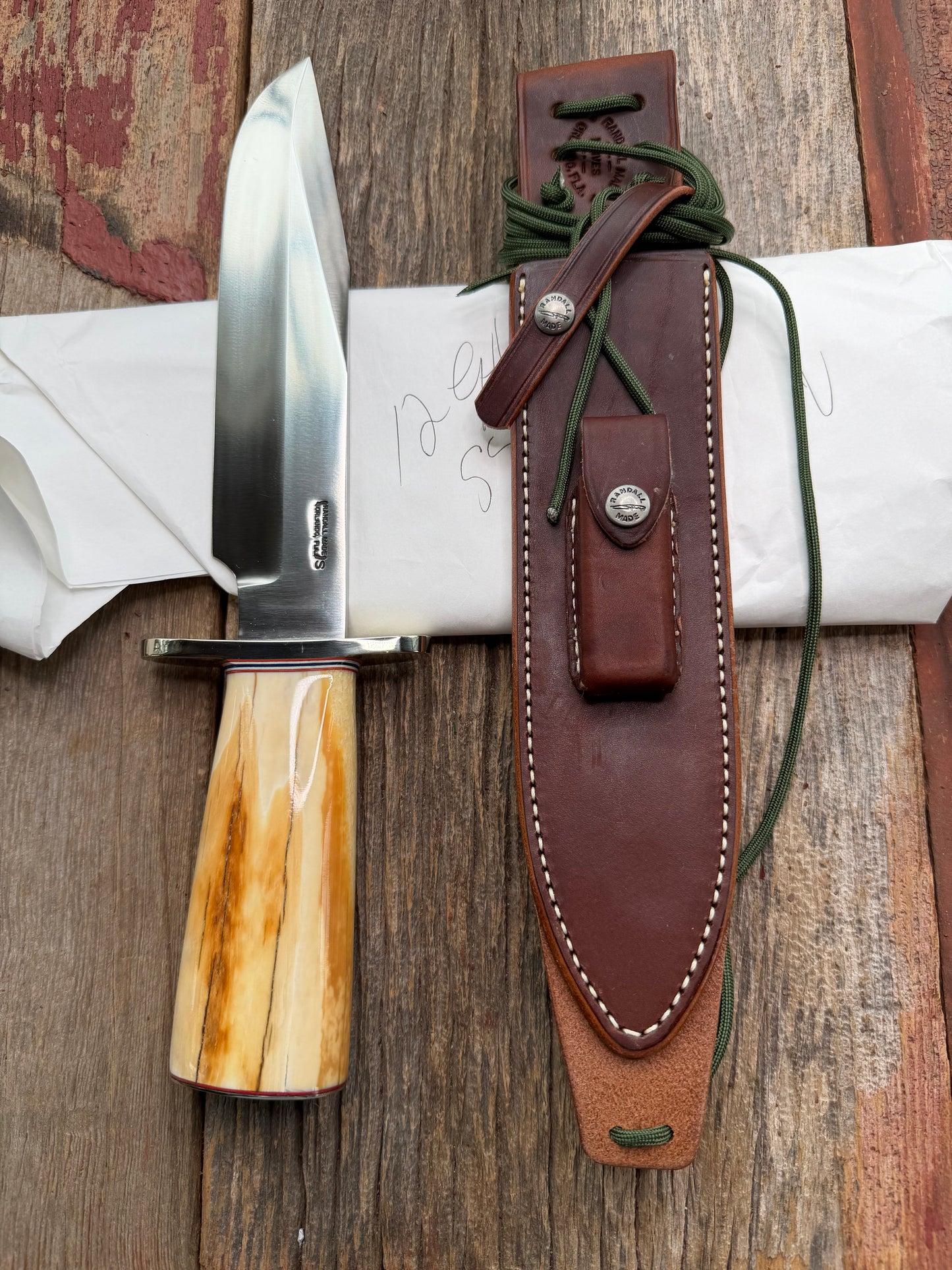 New in Paper Randall Knife Model 12-9 beautiful Fossil walrus handle, incredible colors (creams, browns , oranges) Double Nickel Silver hilt, nickel plate, Stainless Steel, RWB spacers