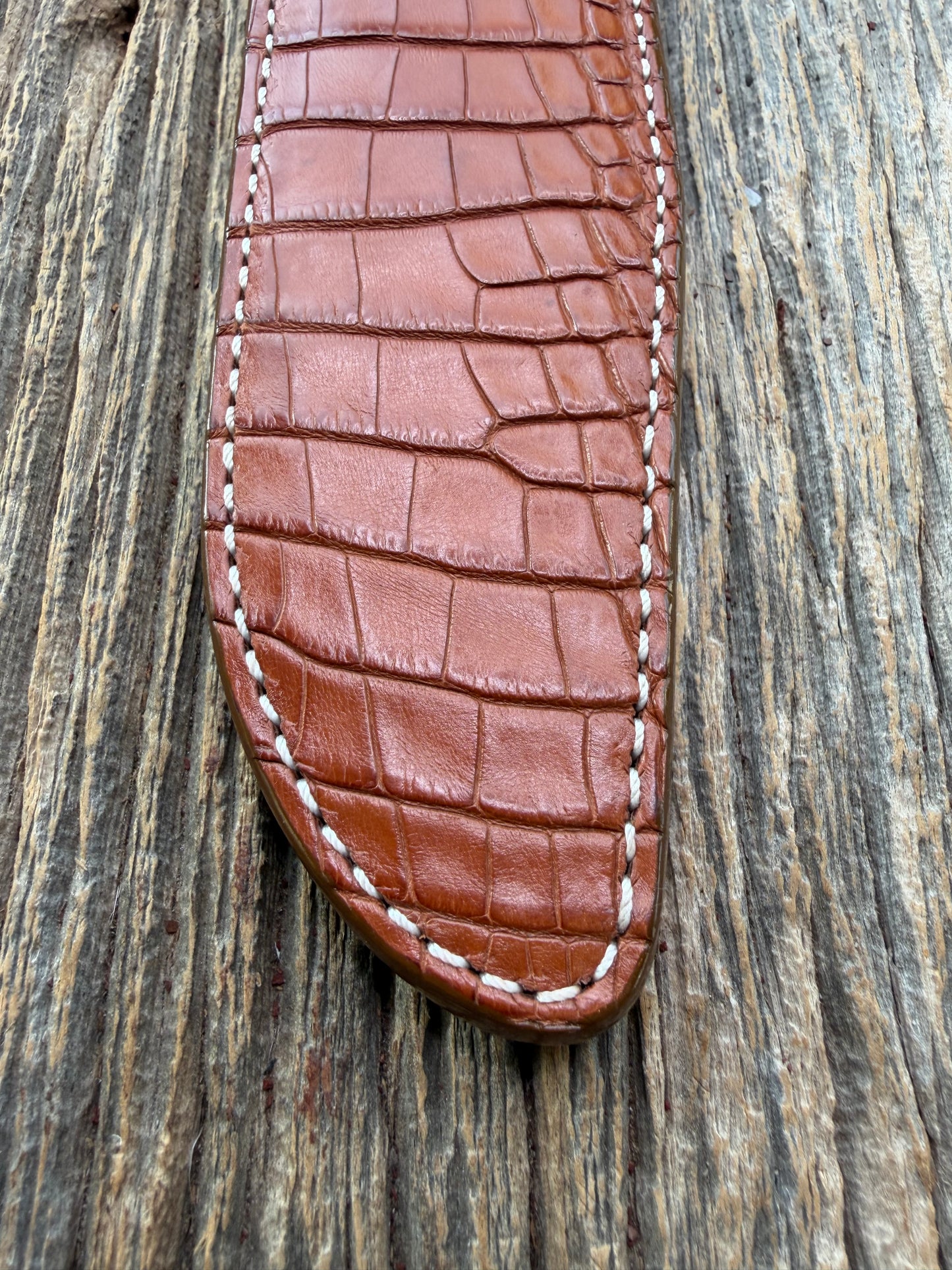 New Randall Model 1-8 Sheath in Exotic thick and textured Honey Crocodile skin on brown leather from Treeman with a silver Canteen snap. Hand tooled belt loop. Killer sheath.