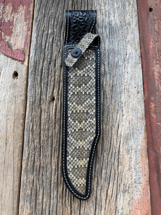 Randall Model Confederate sheath with inlayed Western Diamondback RattleSnake skin from Treeman Sheaths. Very dark skin on brown leather, white deviated stitching and black canteen snaps.