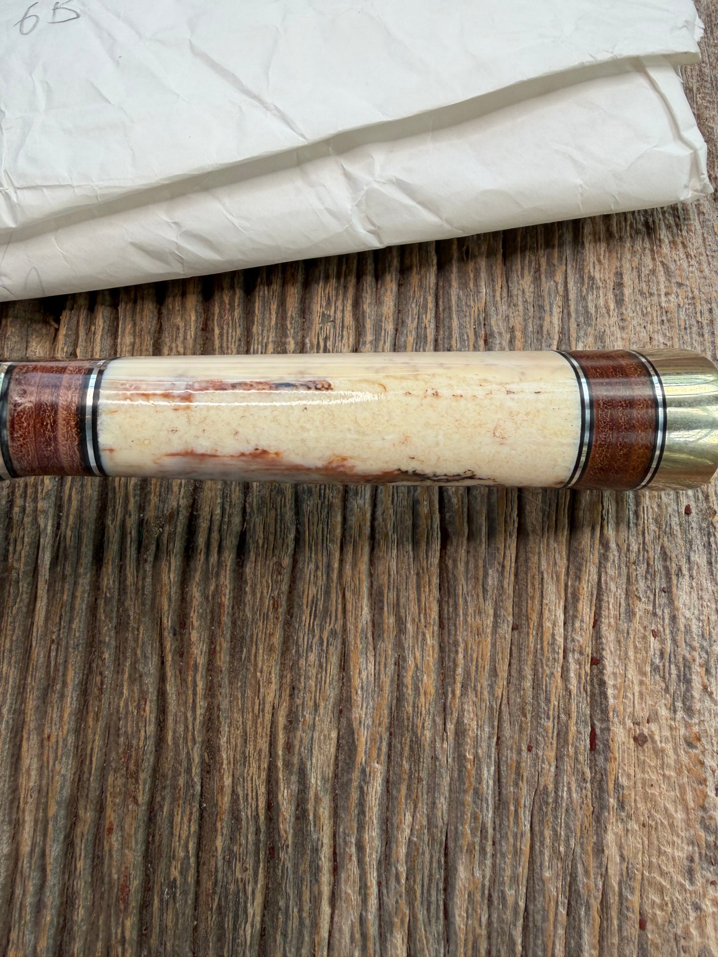 New in Paper Randall Model 12-9 Fossil Walrus Ivory and 25 style stacked Leather grip. Double Nickel Silver hilt and nickel butt cap.