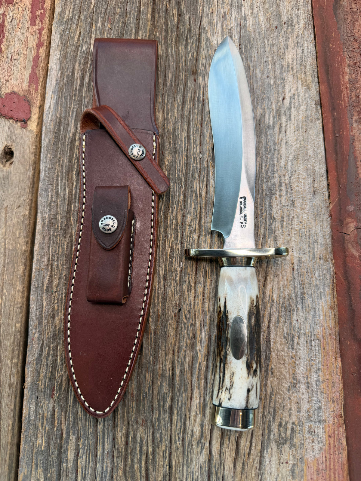 New in Paper Randall Model 12-8 Small Sasquatch with a really nice piece of stag. #1112, Nickel Silver collar and butt cap.