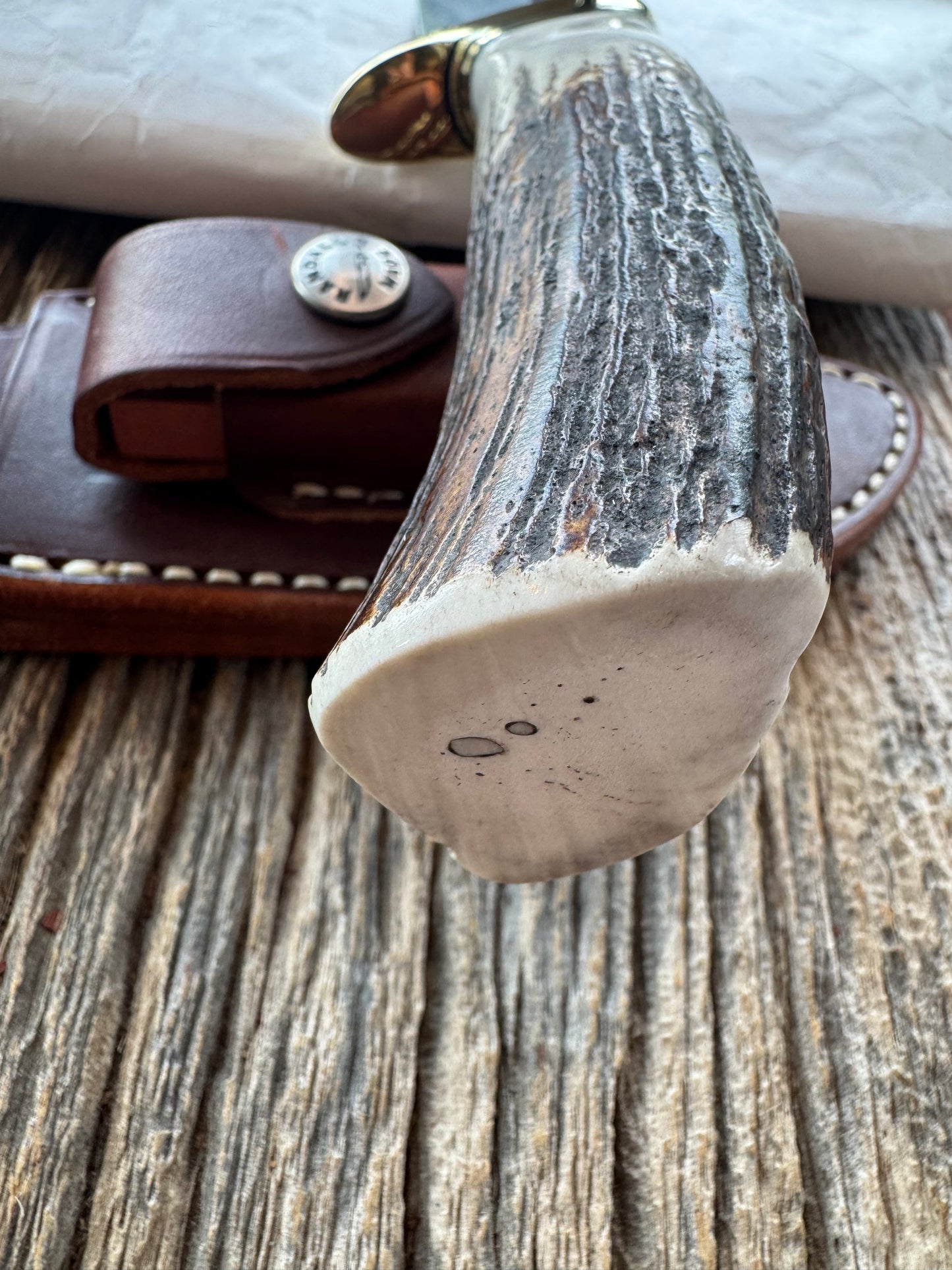 New in paper Randall Model 23 Game Master in Stag with a natural end. Stainless steel blade, Brass Single hilt and Brown leather sheath.