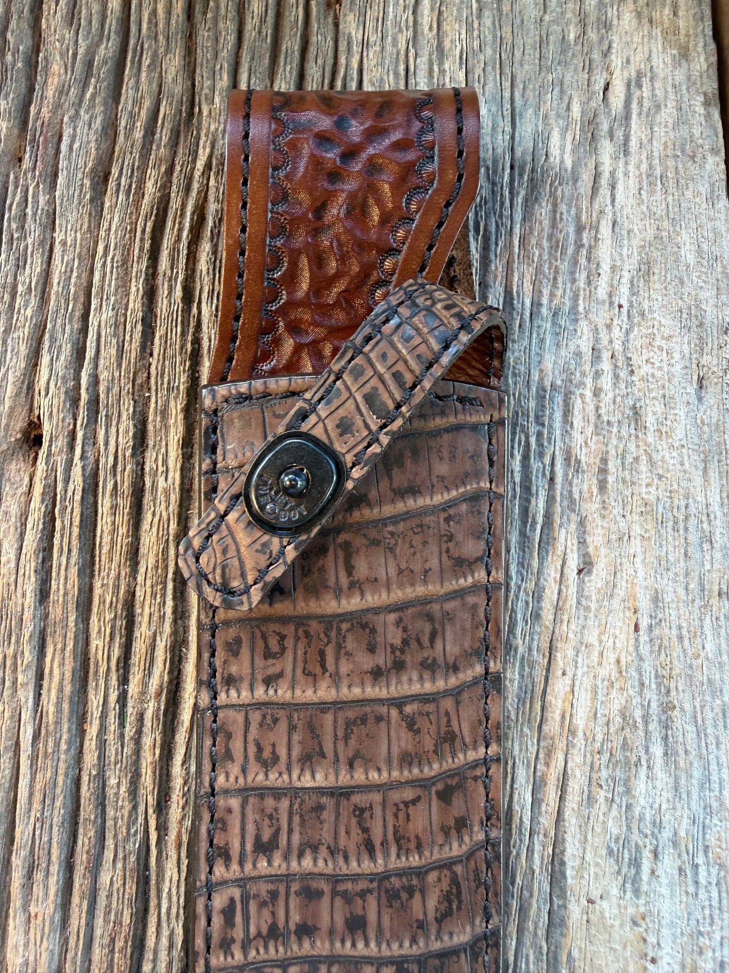 New Randall Model Clinton Special Sheath in Exotic Dark Brown Sueded Crocodile from Treeman with the newest Black Canteen snap.