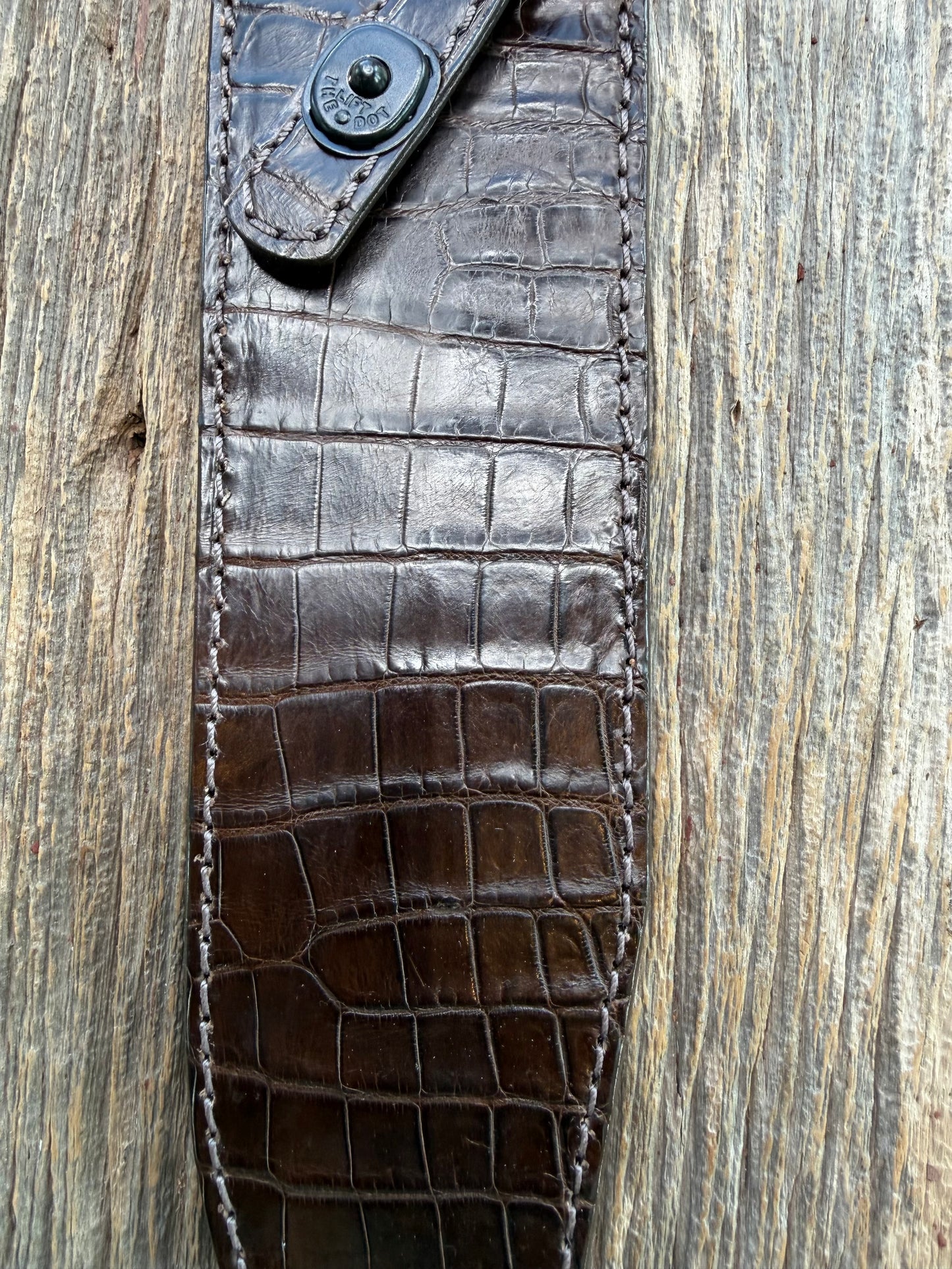 New Randall Model 12-9/14 Grind  Sheath in Exotic Chocolate Brown Matte Crocodile from Treeman with the newest Black Canteen snap. Killer sheath.