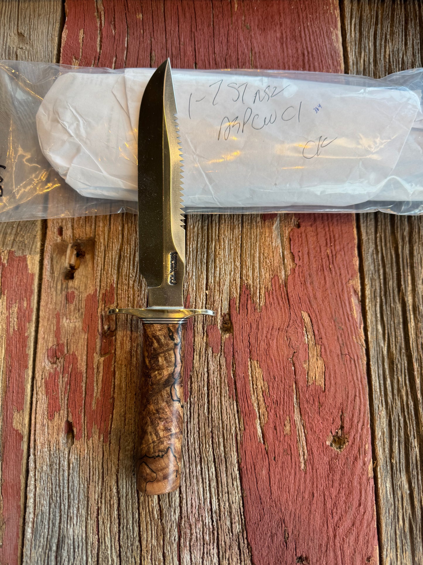 New in paper Randall Knife Model 1-7 Spalted Ebony wood Handle. Carbon Steel Blade, compass and Sawteeth.