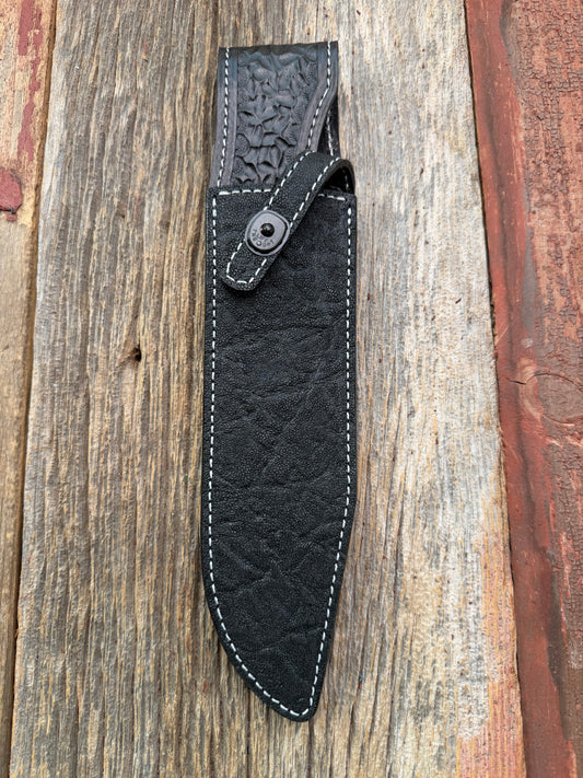 New Randall Model 12-9 Sheath in Exotic Black Matte Elephant Hide from Treeman with a Black Canteen snap. White thread deviated stitching on black leather..Killer sheath.
