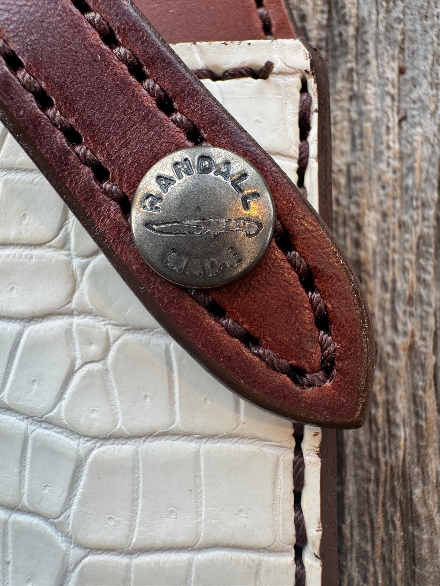 New Randall Model 1-8 or 2-8 Sheath in Exotic white Natural Croc with Anus and full leather belt loop. Custom Made at Sullivan’s by Gutcher with Randall stamp on back and snap.