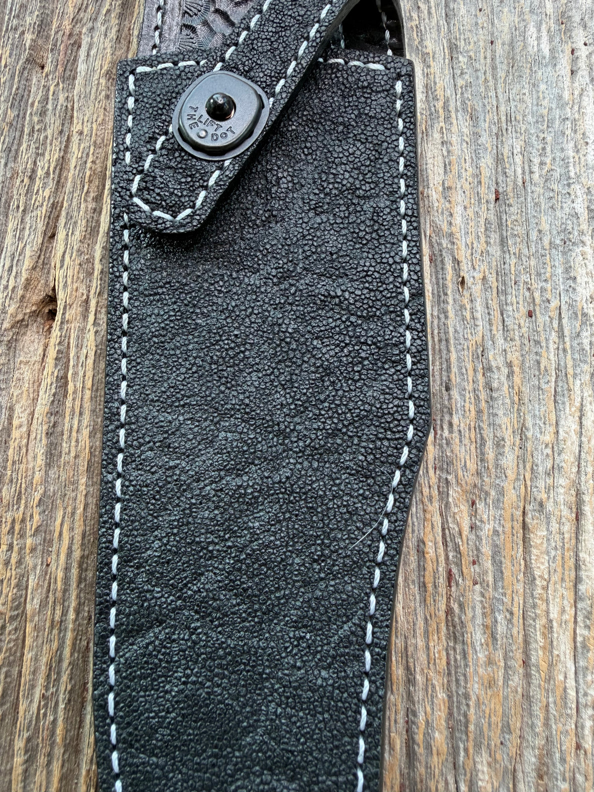 New Randall Model 12-8 Sheath in Exotic Black Matte Elephant Hide from Treeman with a Black Canteen snap. White thread deviated stitching on black leather..Killer sheath.