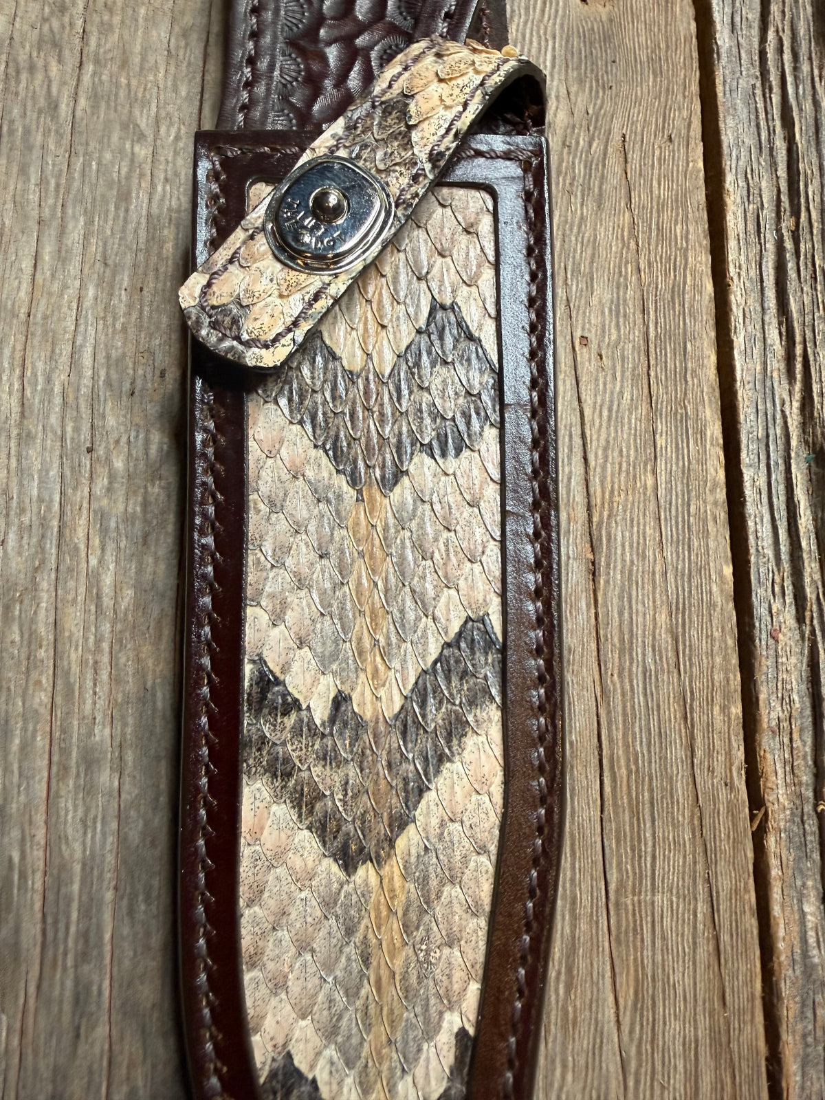 Randall Model 14 sheath with a Canebrake RattleSnake skin from Treeman Sheaths. Vibrant colors and along side Copperheads the hardest skin to source.