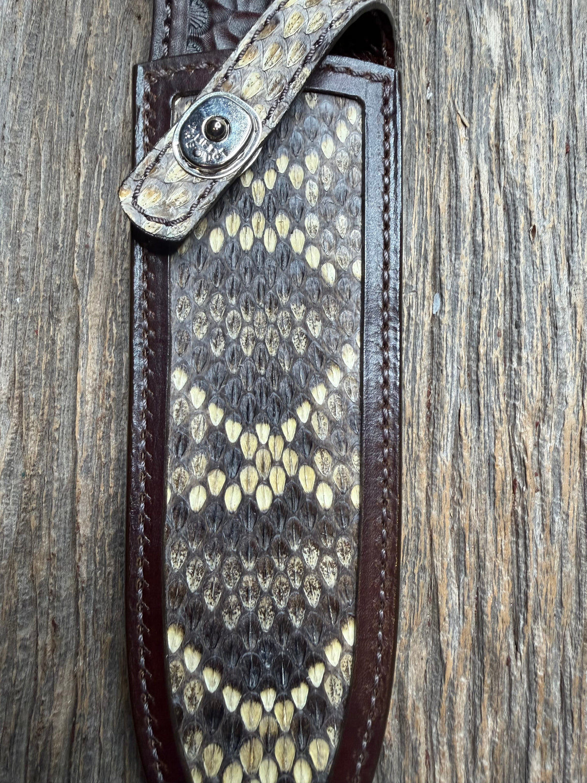 Randall Model Clinton Special sheath with an Eastern Diamondback RattleSnake skin from Treeman Sheaths. Hand tooled belt loop, canteen snap. Vibrant colors and one of the hardest skins to source.