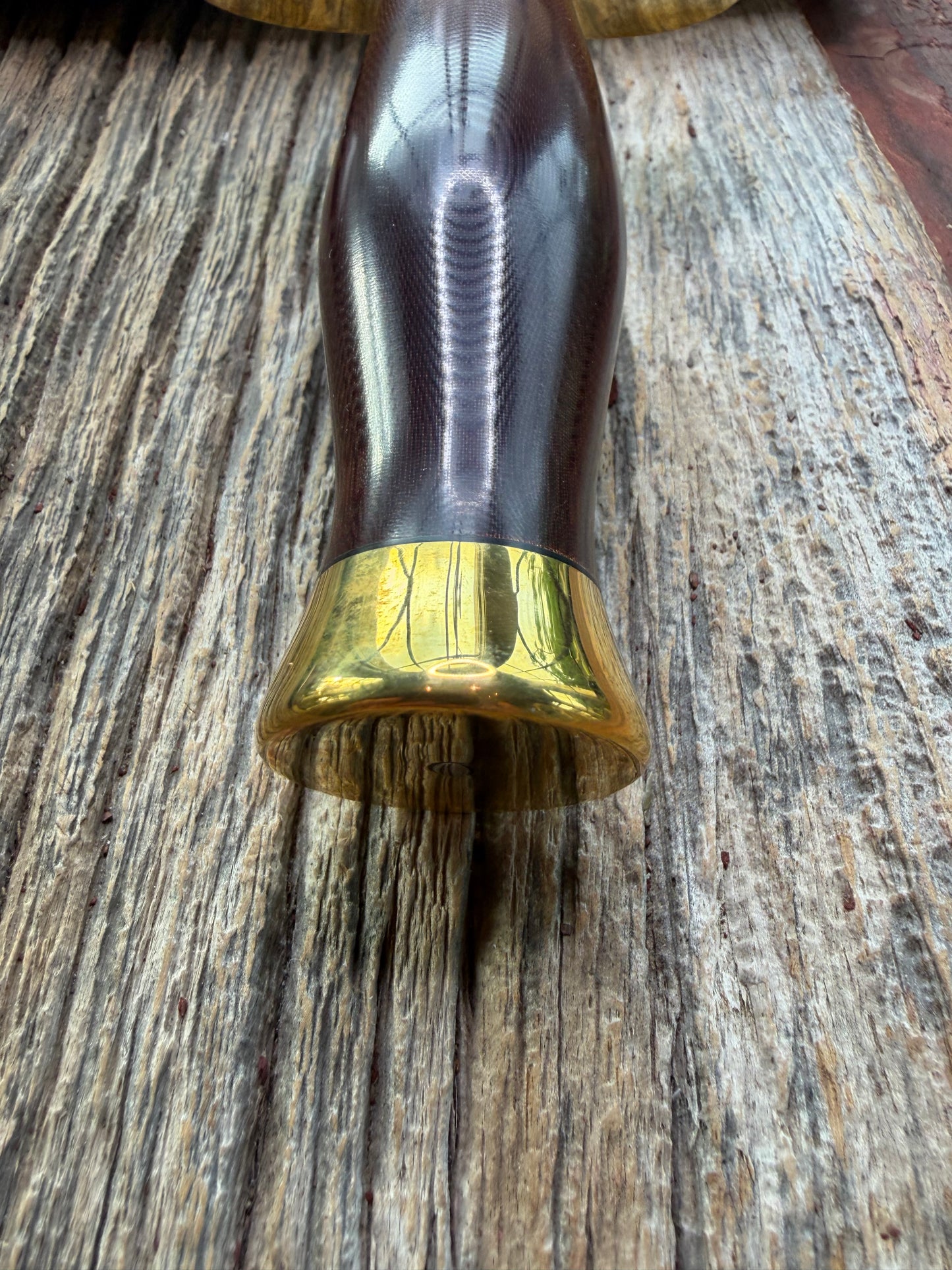 New in Paper Randall Model 12-8 Big Bear with a Maroon Micarta handle. Brass Hilt  and Brass collar, Carbon steel, brass butt cap.