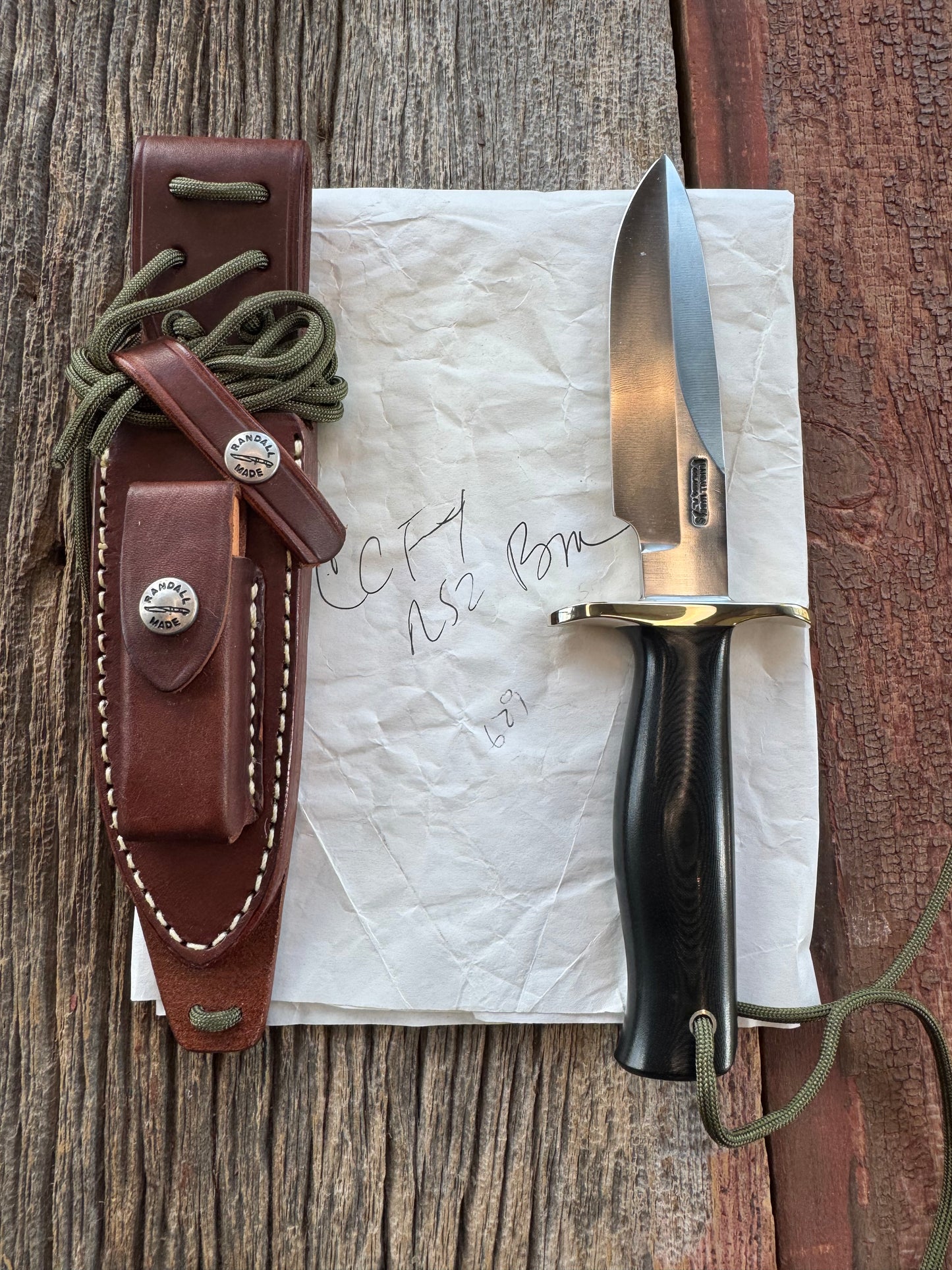 New in Paper Randall Knife Model Combat Companion Black Micarta Handle Stainless Steel, NSH , Lanyard, Nickel Silver Double Hilt.