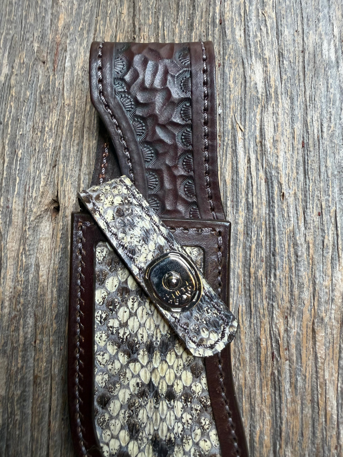 Randall Model Bowles Special sheath with an Eastern Diamondback RattleSnake skin from Treeman Sheaths. Hand tooled belt loop, canteen snap. Vibrant colors and one of the hardest skins to source.
